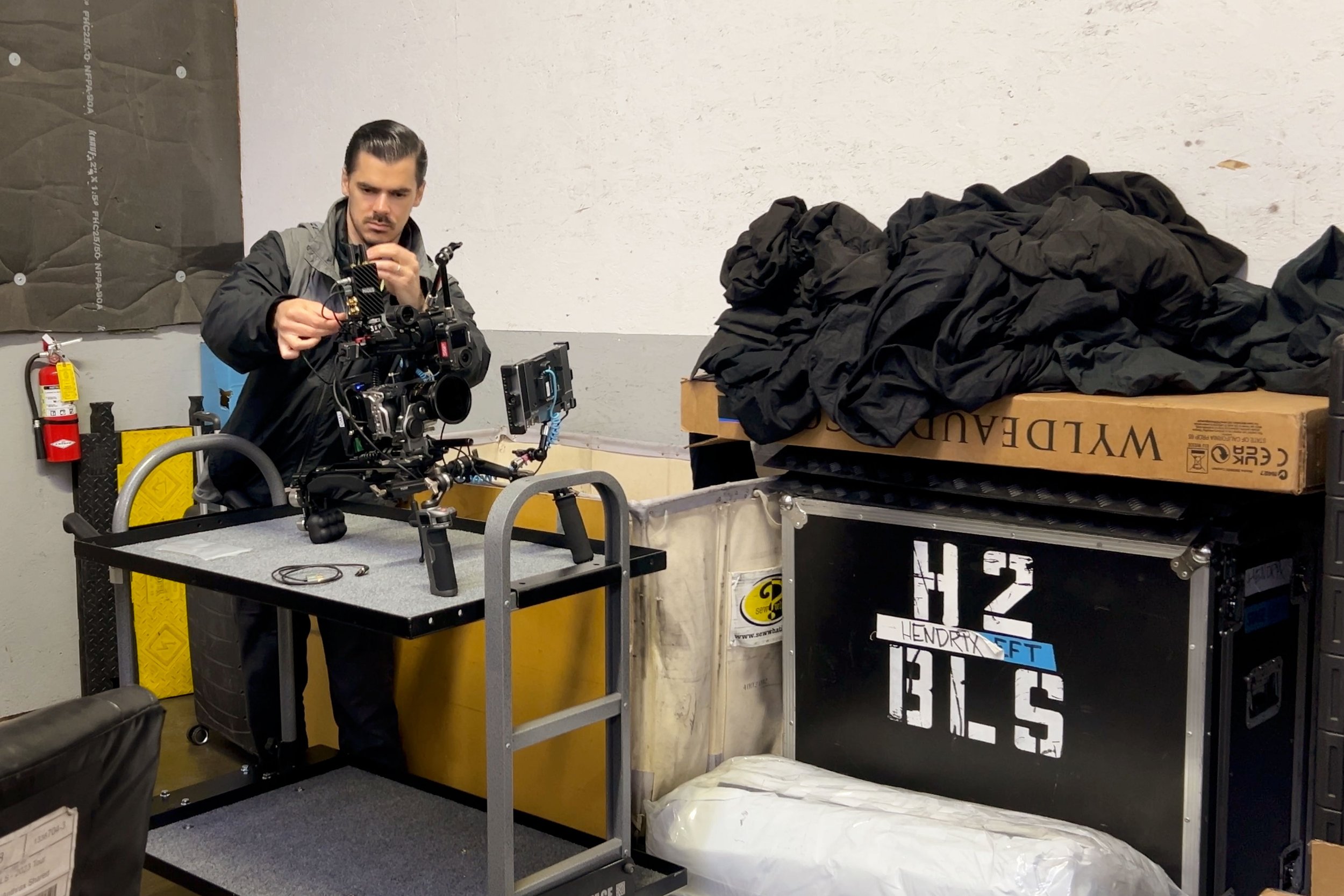 Behind-the-scenes production photo showing the camera rig and set for the Zakk Wylde Wylde Audio shoot.
