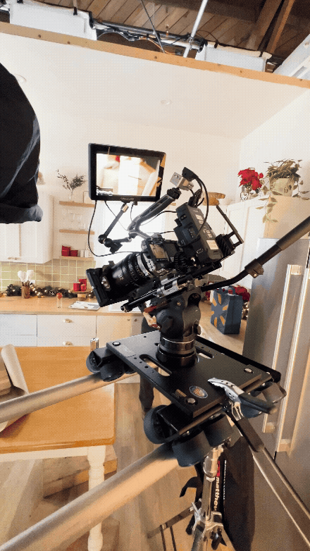 Camera and dolly rig positioned on the kitchen tabletop set during the Coca-Cola Walmart production