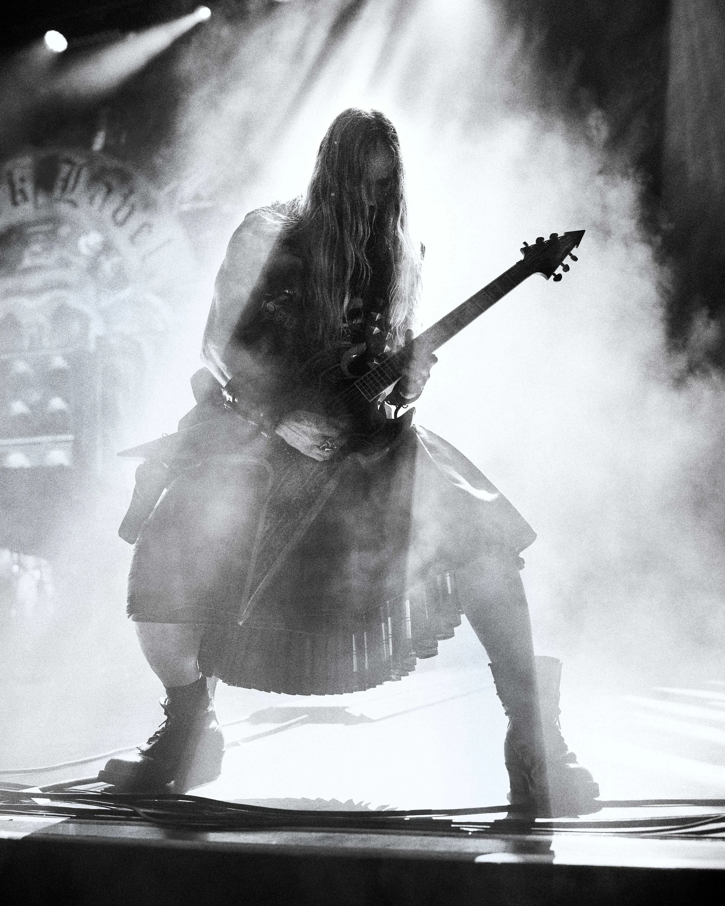 Black-and-white live performance shot of Zakk Wylde on stage at YouTube Theatre.