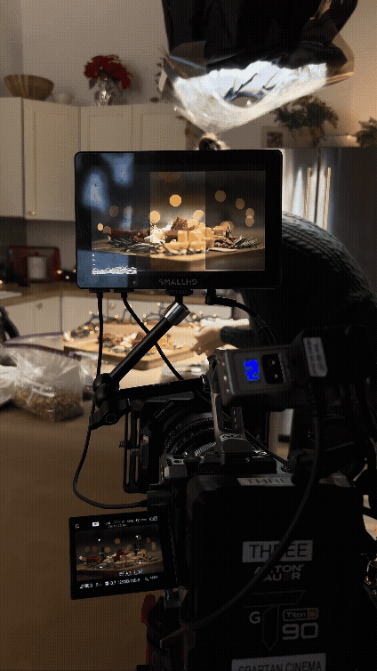 On-set monitor showing the Coca-Cola tabletop scene framed up during the Walmart studio shoot