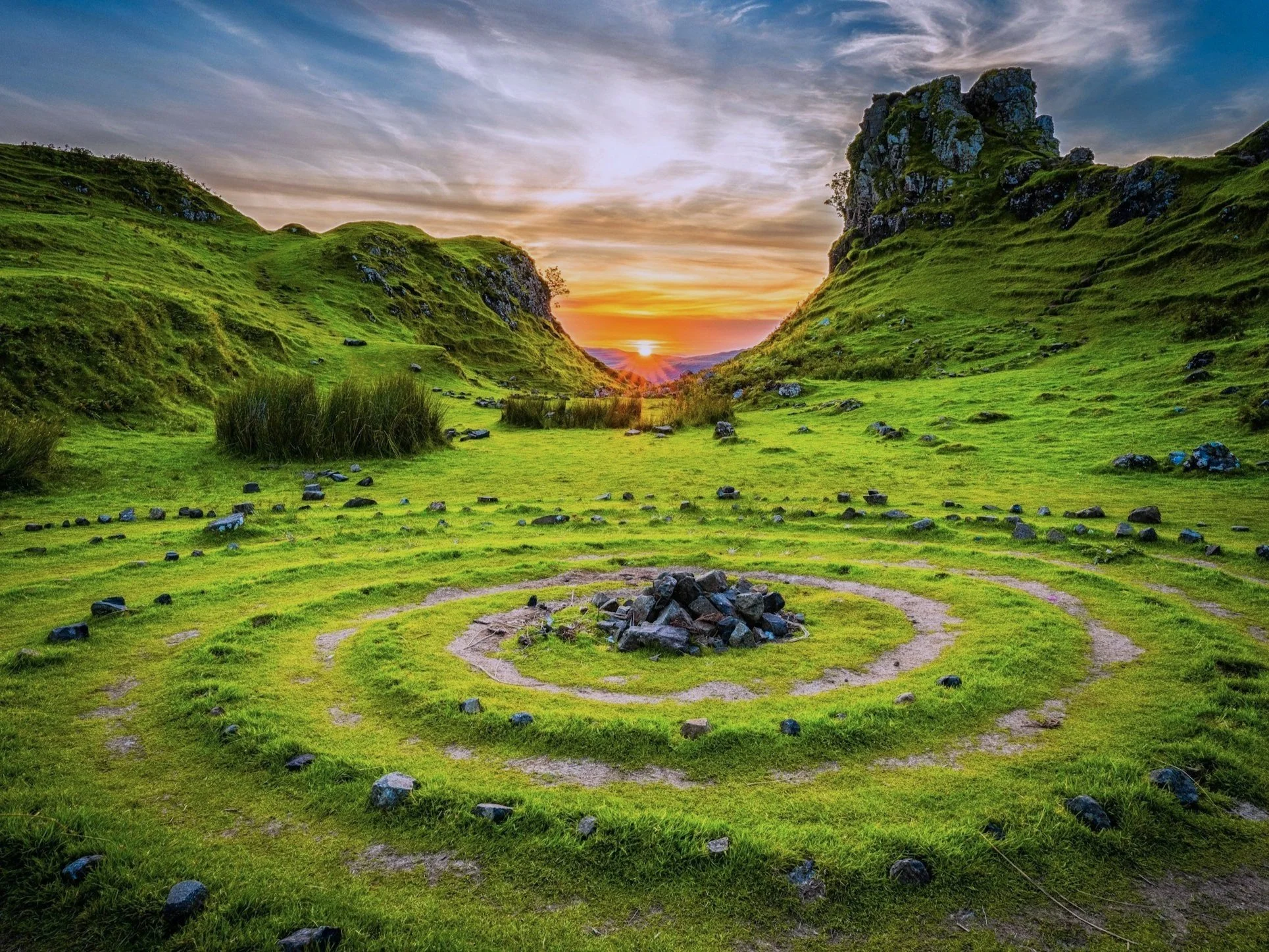 Green spiral circle with stones in center