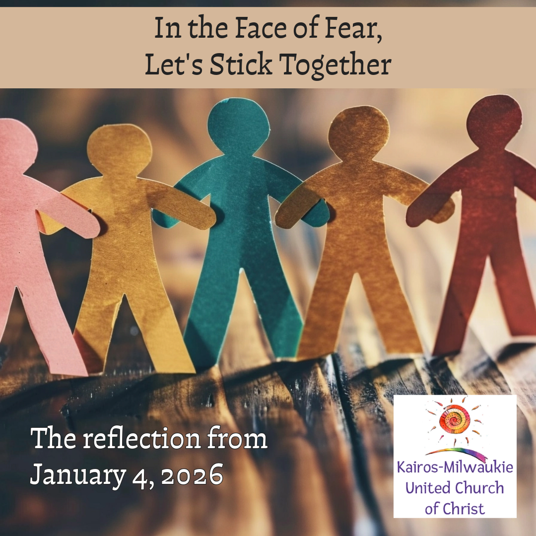 Image of multi-colored people-shaped paper cutouts.