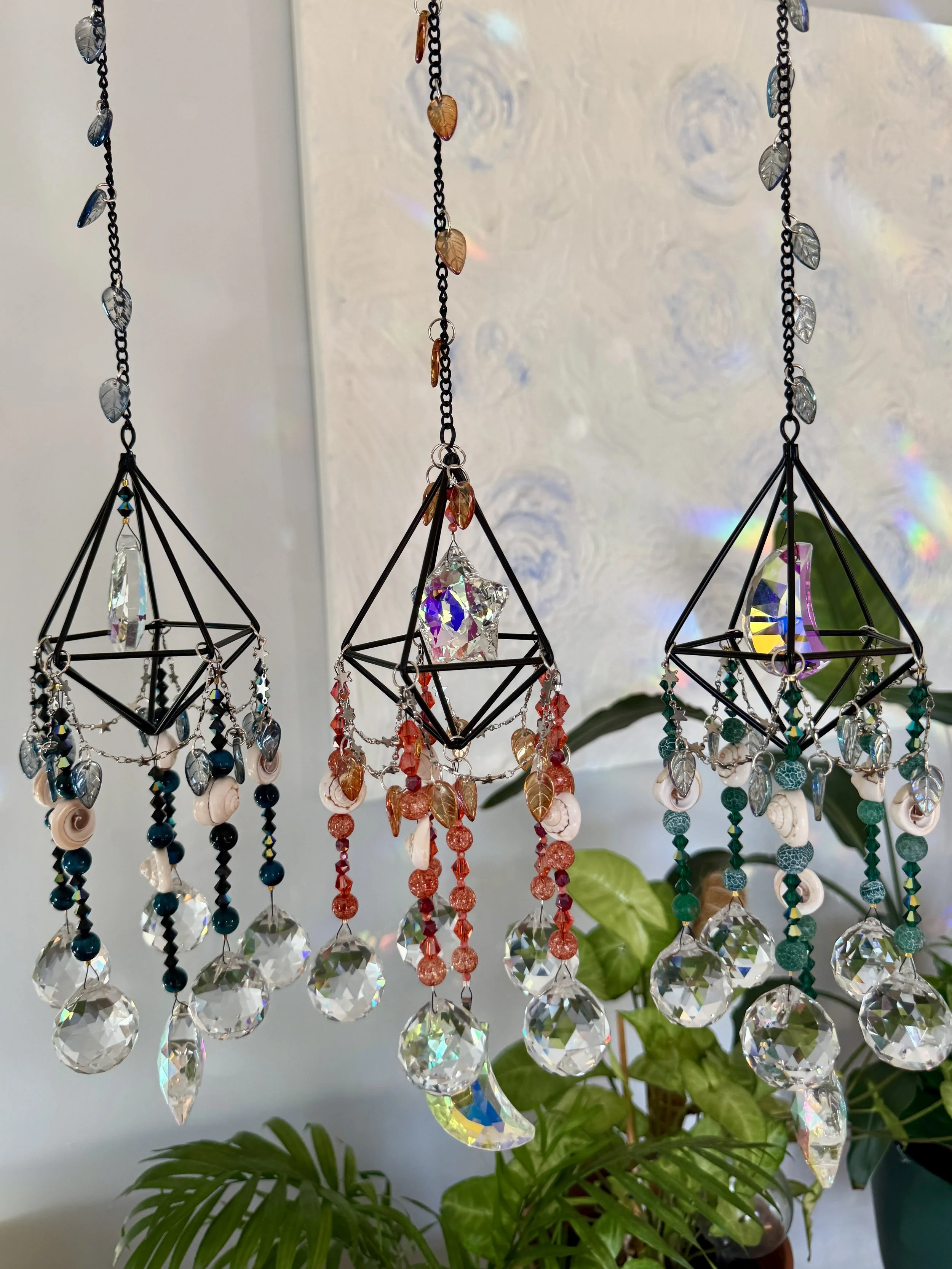 group of moon Star Cage Suncatchers