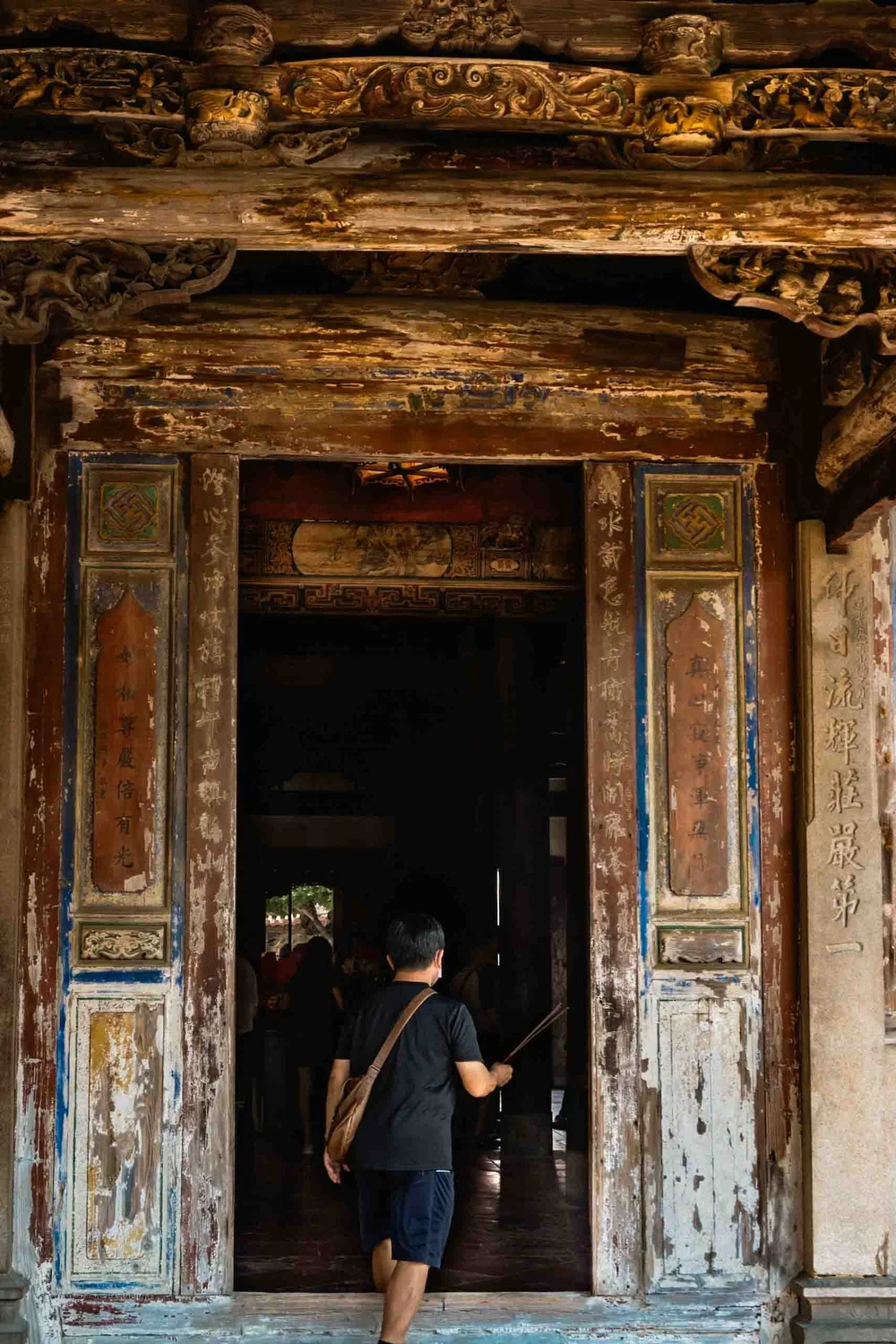 man entering the lungshan temple 