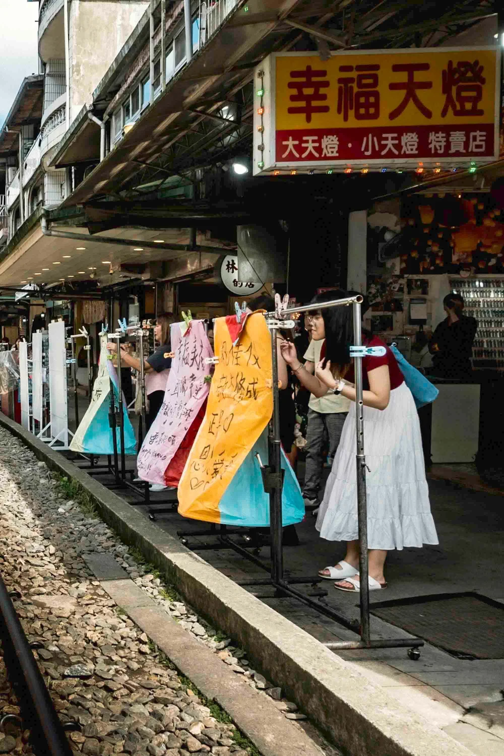 Girl writing lantern Shifen