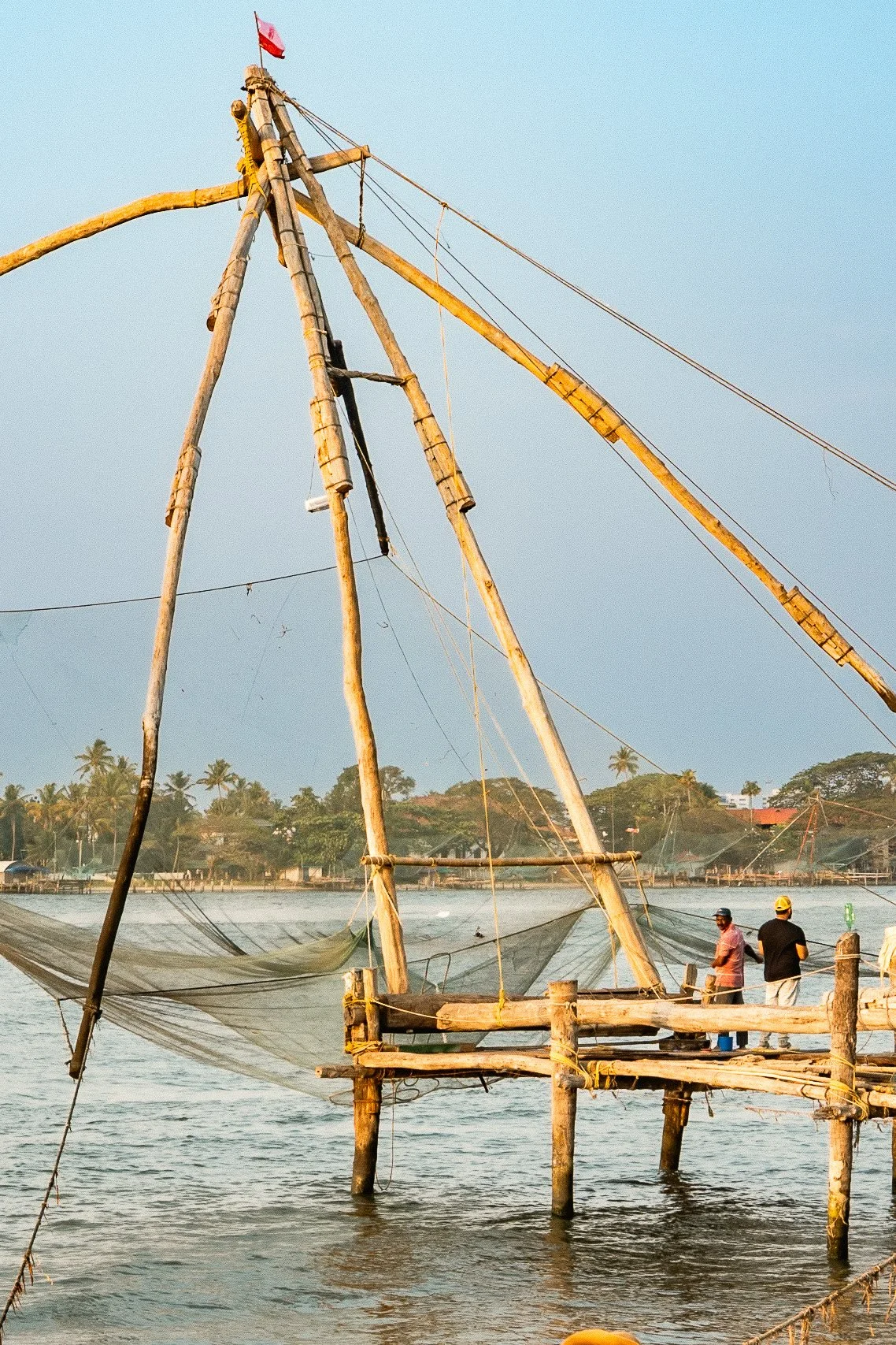 A wooden chinese fishing net at the water in Fort Kochi.