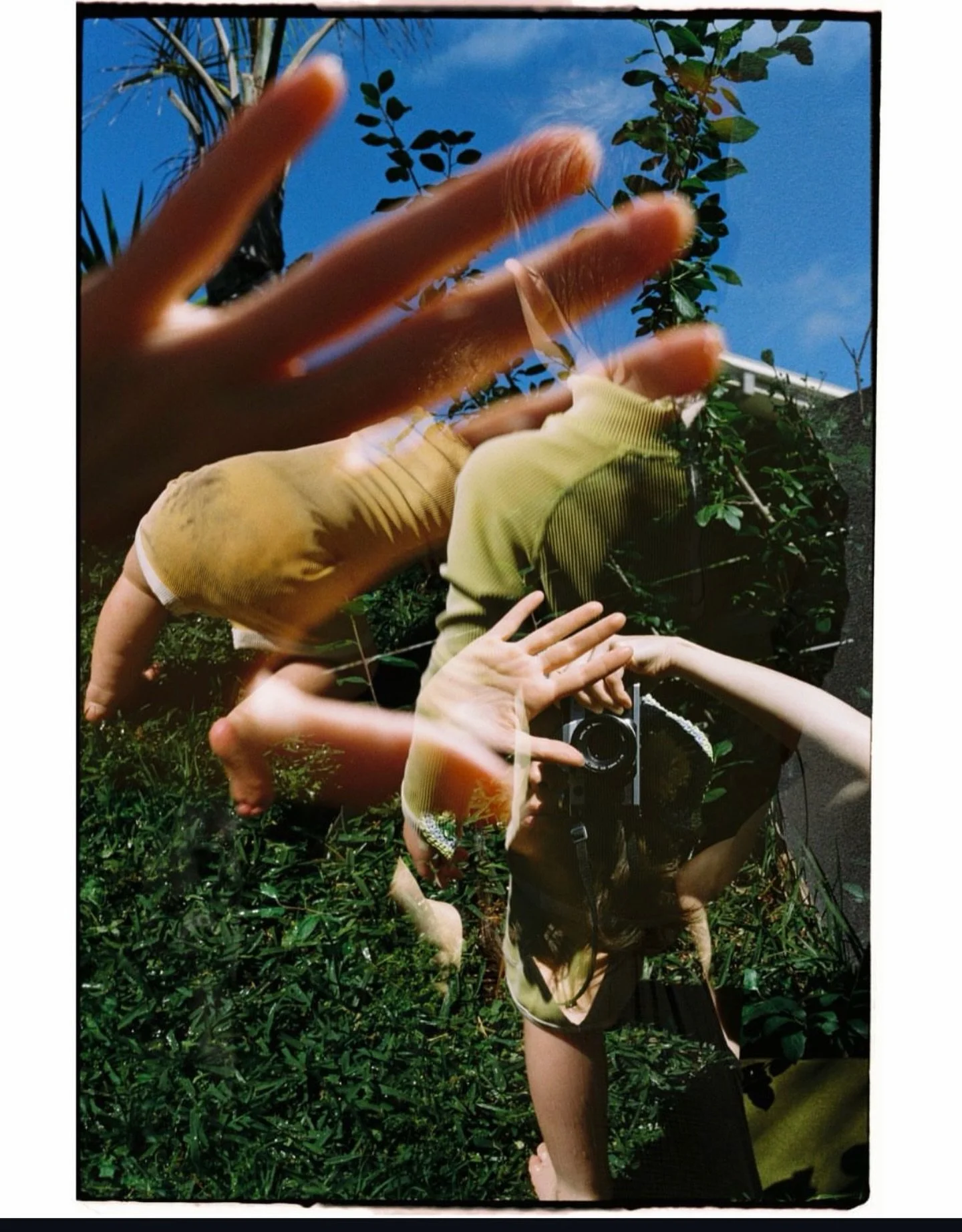 &lsquo; Excerpt from a blind double shot roll.
Self portrait and my two youngest sons.
Savouring the soft drift into warmer days among the garden&rsquo;s green.
On film, November 2025.&rsquo; - @flowersthroughfences 

🏷️ Keep tagging #herexposure