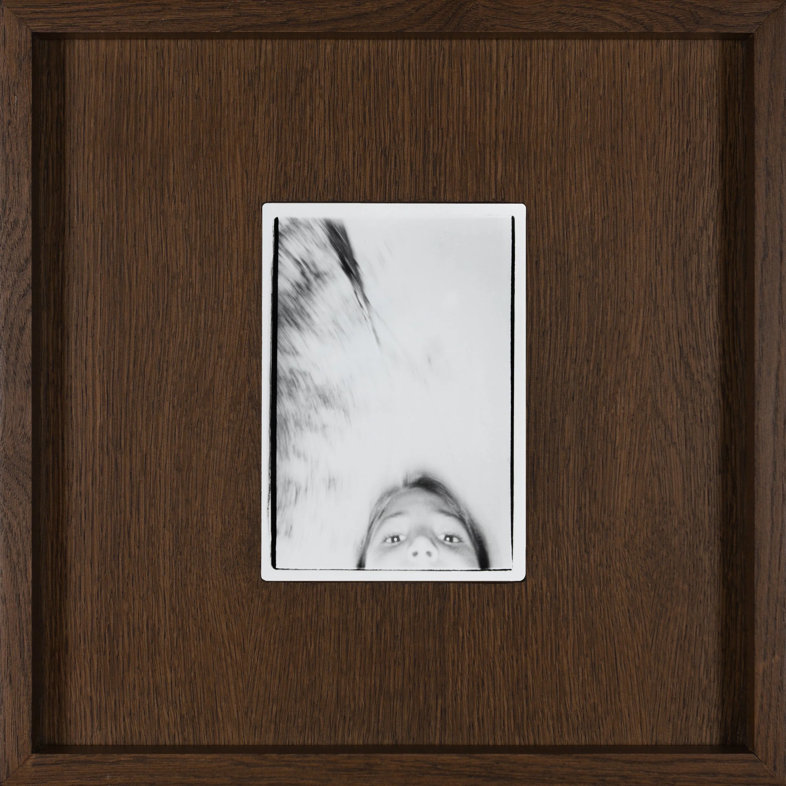 Havin, 10 years old, capturing the world from her perspective with her small, tiny camera