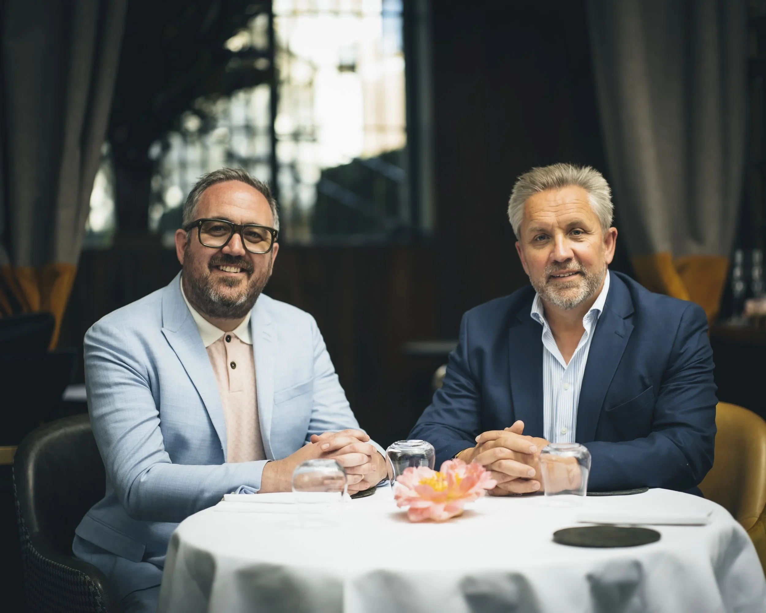 Andrew Fishwick and Justin King of Hestia at a restaurant table