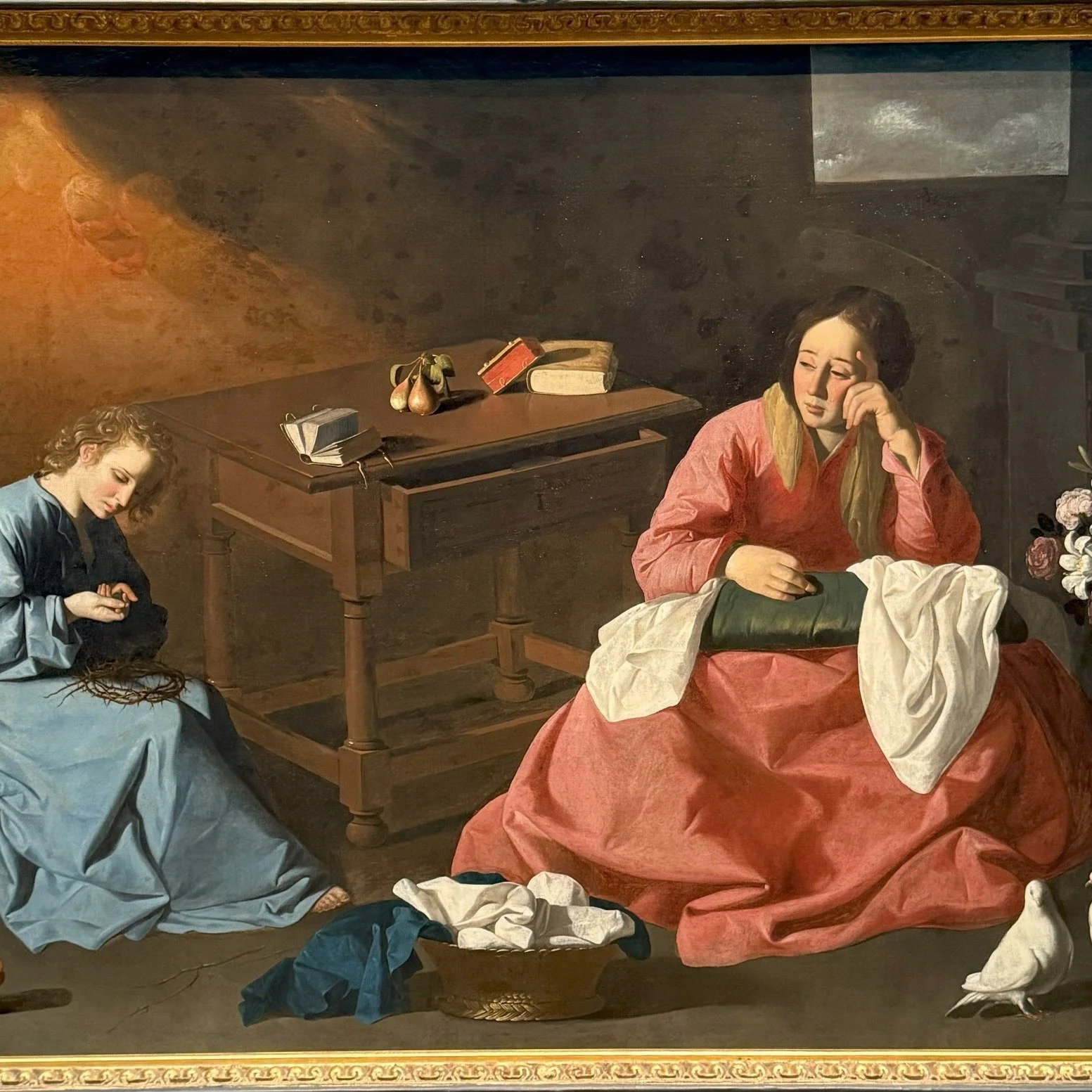 Christ and the Virgin in the House at Nazareth (c.1640) Francisco de Zurbar&aacute;n.  We see an adolescent Jesus crafting a crown of thorns and pricking his finger as Mary sorrowfully observes him; in deep contemplation of his inevitable fate.  Jesu