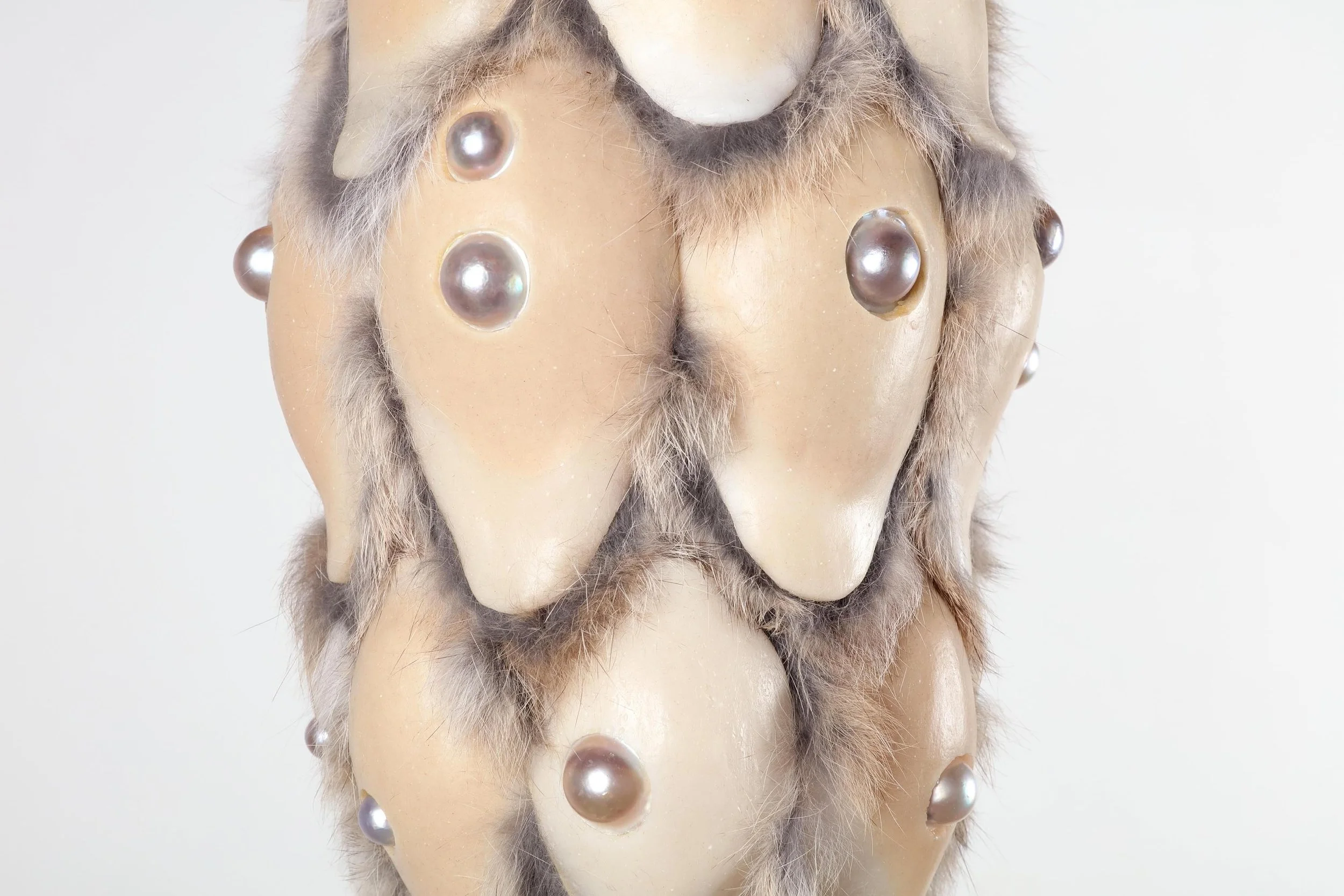 Prayer (pinaceae), 2024, h.45 x w.19 x d.19 cm, Silicone, licorice, pigment, rabbit fur, half-round pearl