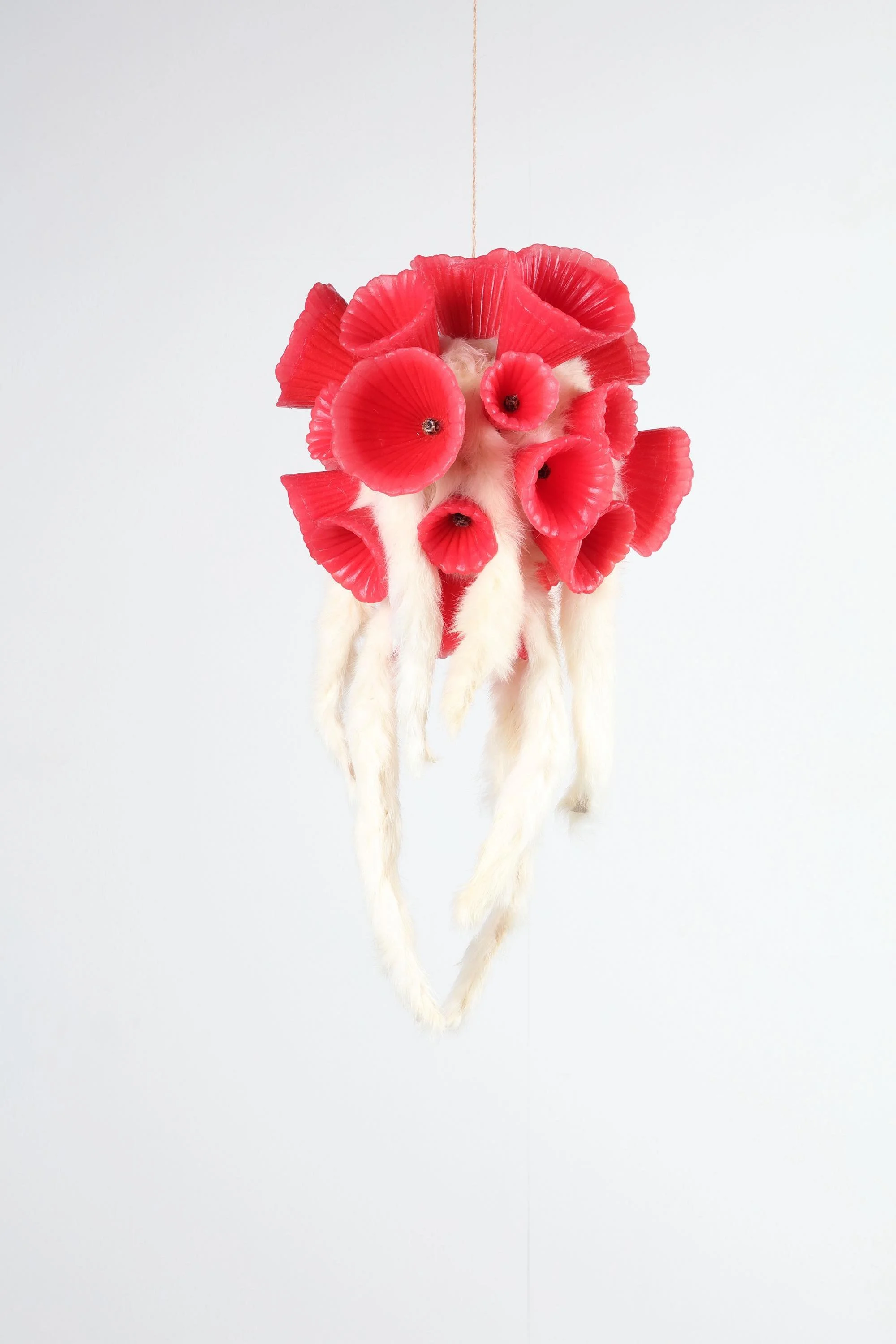 Prayer (calyx), 2025, h.48 x w.30 x d.30cm, Silicone, pigment, rabbit fur, flower calyx