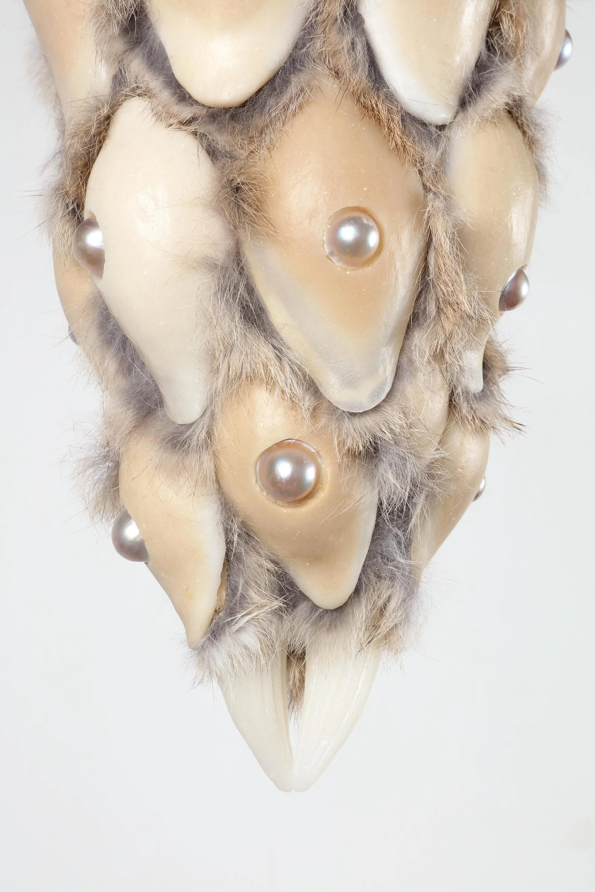 Prayer (pinaceae), 2024, h.45 x w.19 x d.19 cm, Silicone, licorice, pigment, rabbit fur, half-round pearl