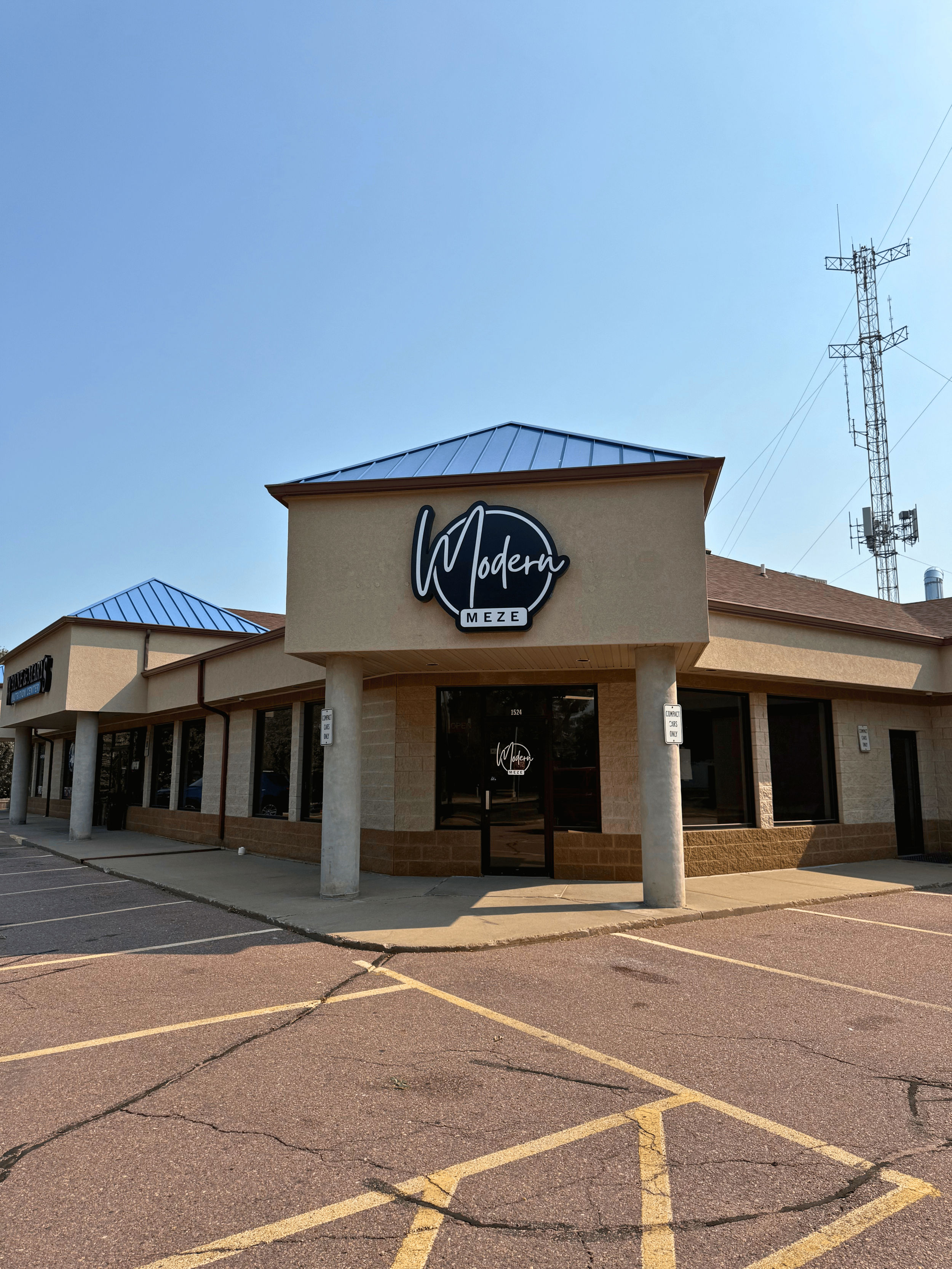 modern meze storefront signage