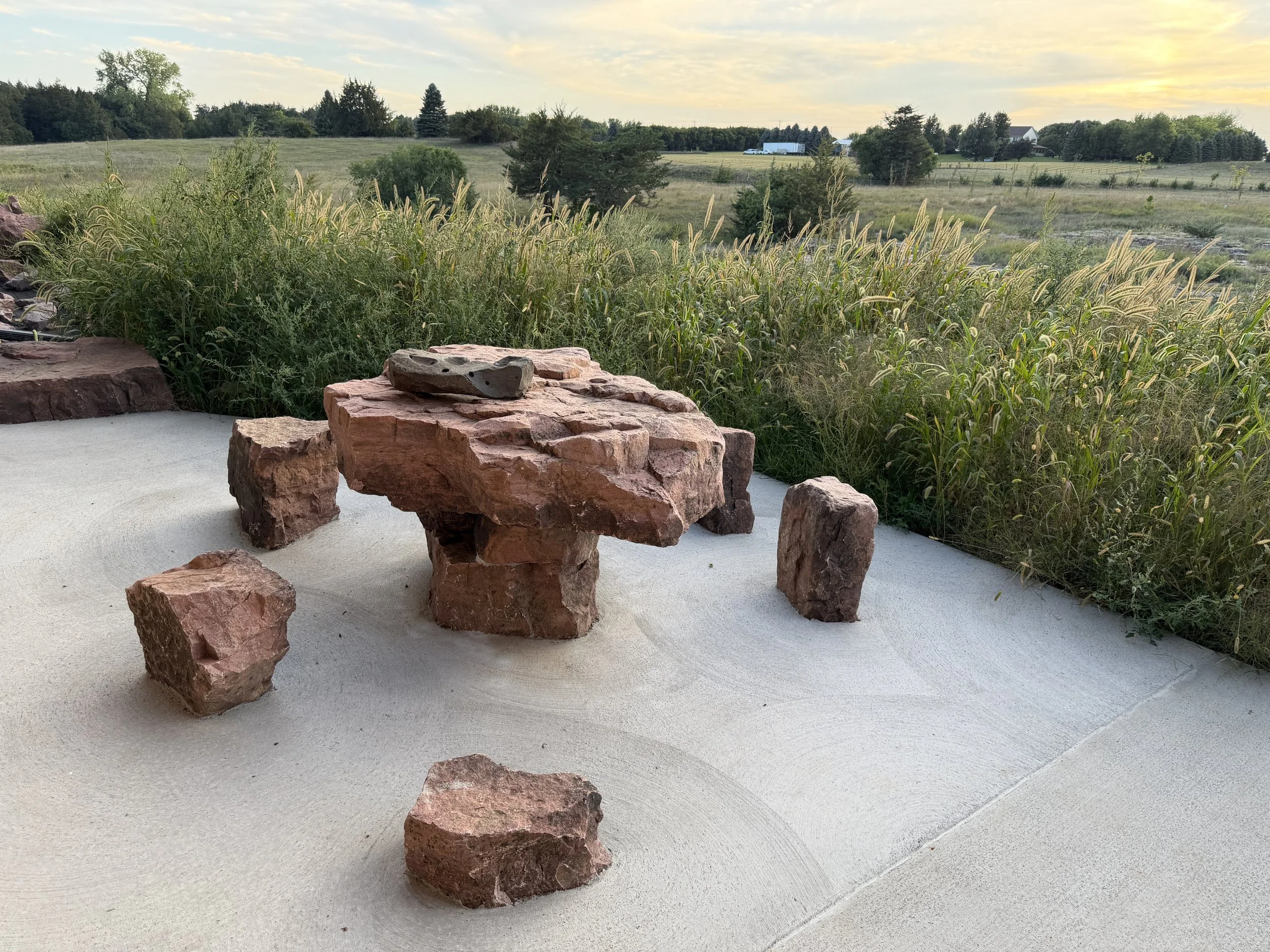 custom quartz patio furniture and backyard view