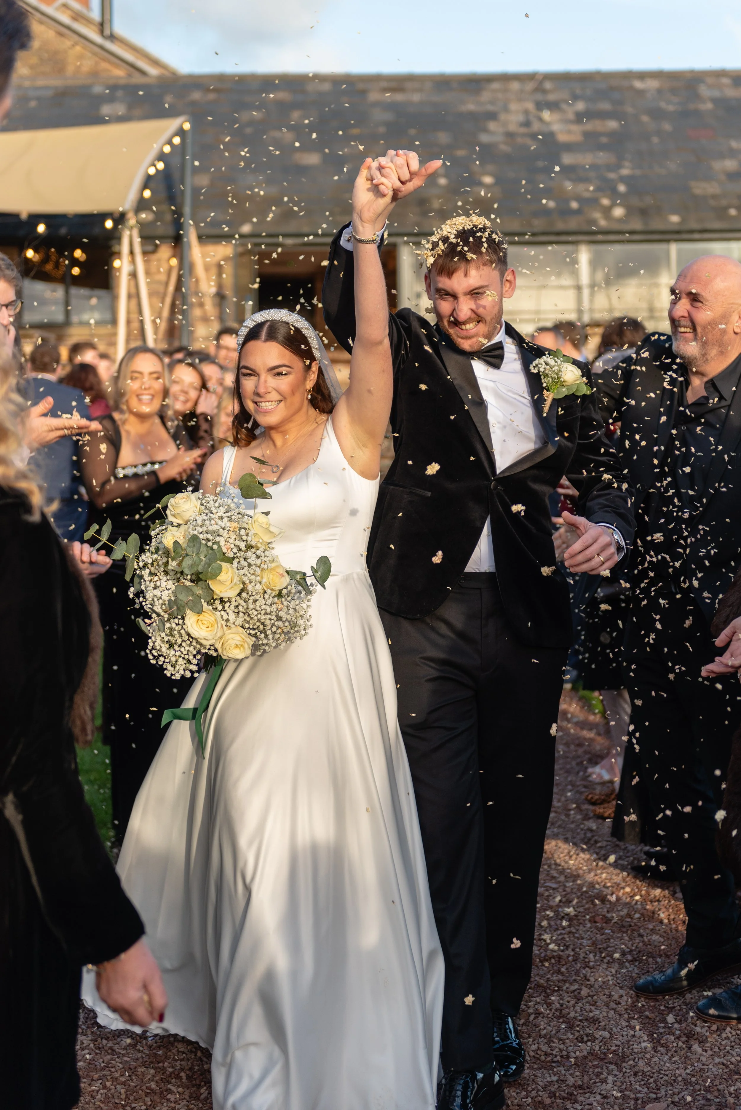 confetti shot, documentary style photography at llantilio house, abergavenny wedding venue