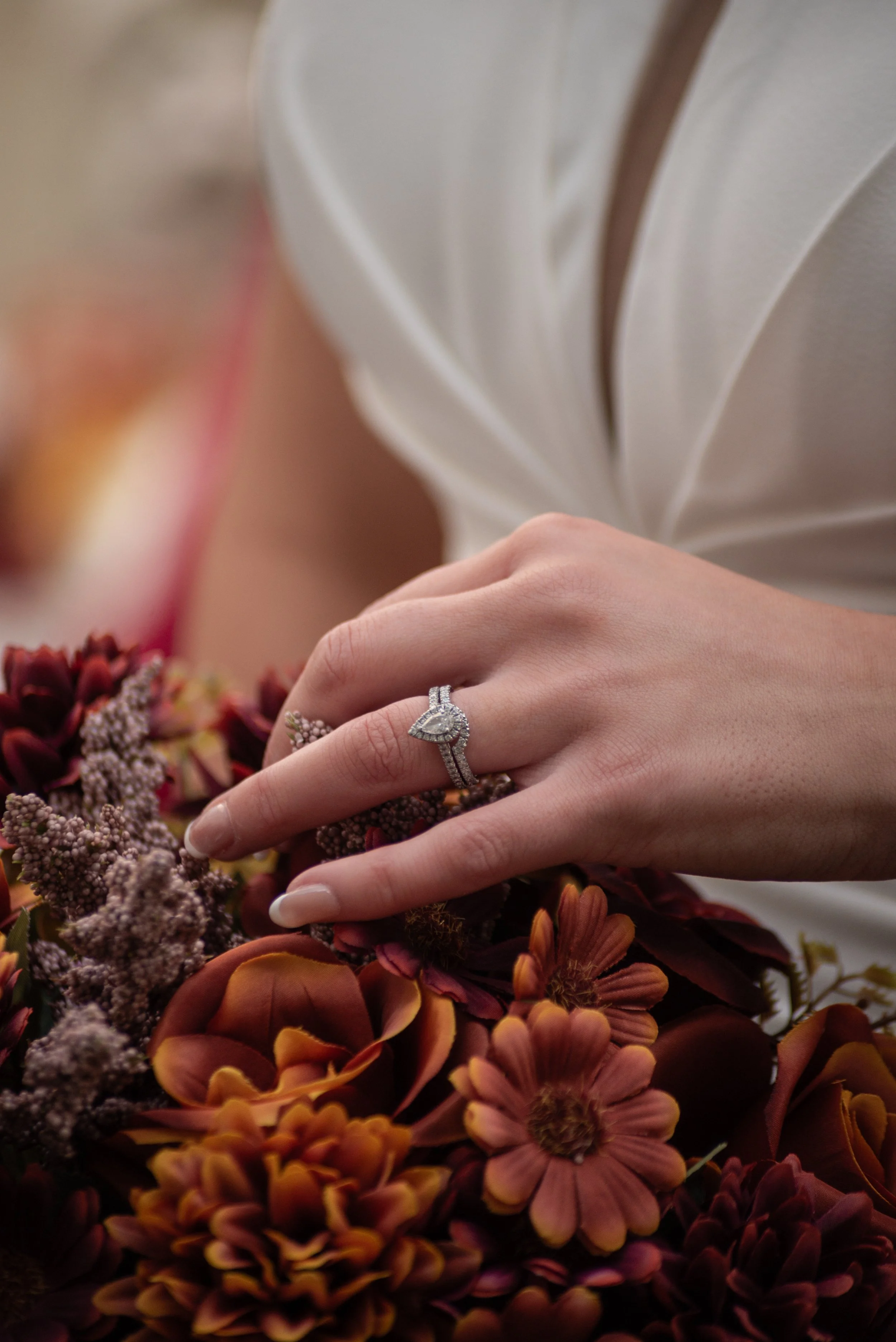 Close up shot of wedding band with florals for wedding in Caerphilly
