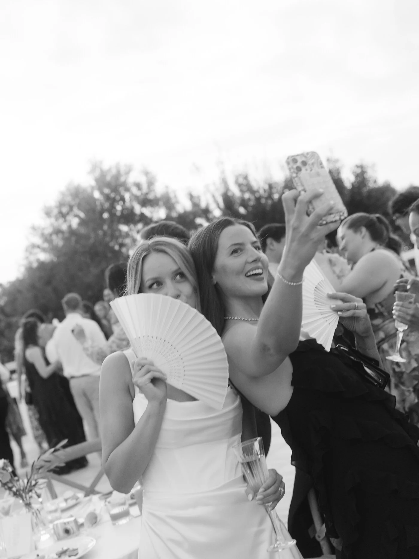 masseria traetta wedding, surrounded by the kind of friends who make everything feel lighter.
champagne in hand, fans waving, sunset laughs that turned into lifelong memories.
because your wedding should feel like you... joyful, relaxed, and fully ce