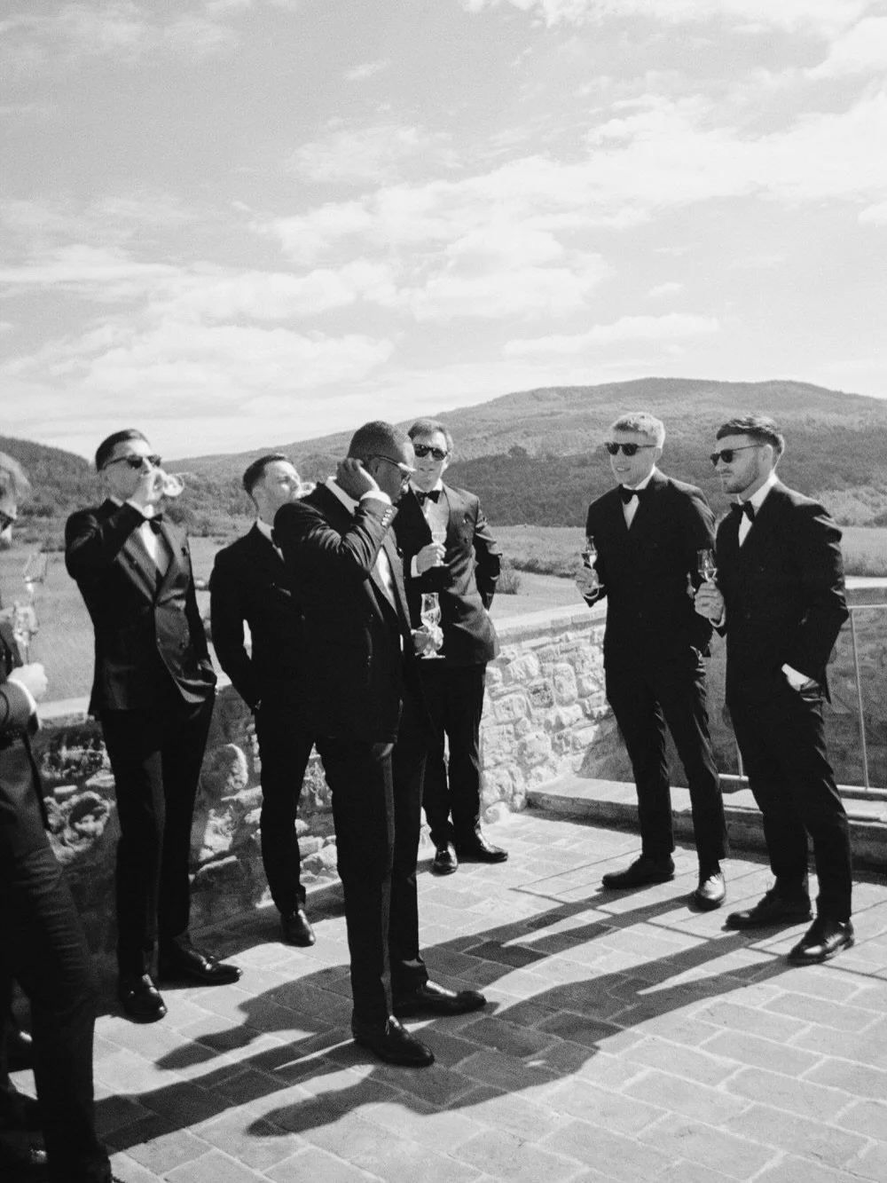 these guys at this @podere_tesoro tuscany wedding have a way of slowing everything down in the best possible way.
the ceremony hasn&rsquo;t started yet. jackets are on. bow ties straight. someone&rsquo;s holding a glass of @champagne_bollinger a litt