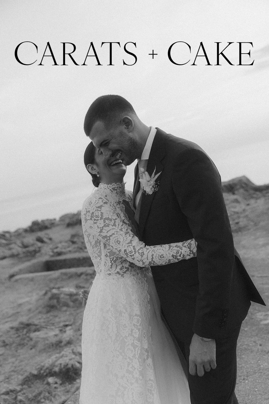 bride and groom share an intimate, joyful moment along the volcanic coast of parco dei sesi in pantelleria, sicily. the bride wears a long-sleeved lace gown by le spose di giò and dior heels, while the groom is in a classic black suit. captured in ti