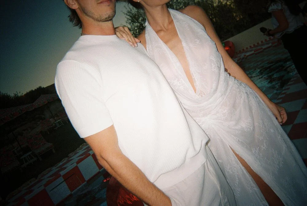 Authentic 35mm film photo detail capturing the cool and effortless bridal couple style of a braccialieri sicily wedding welcome party