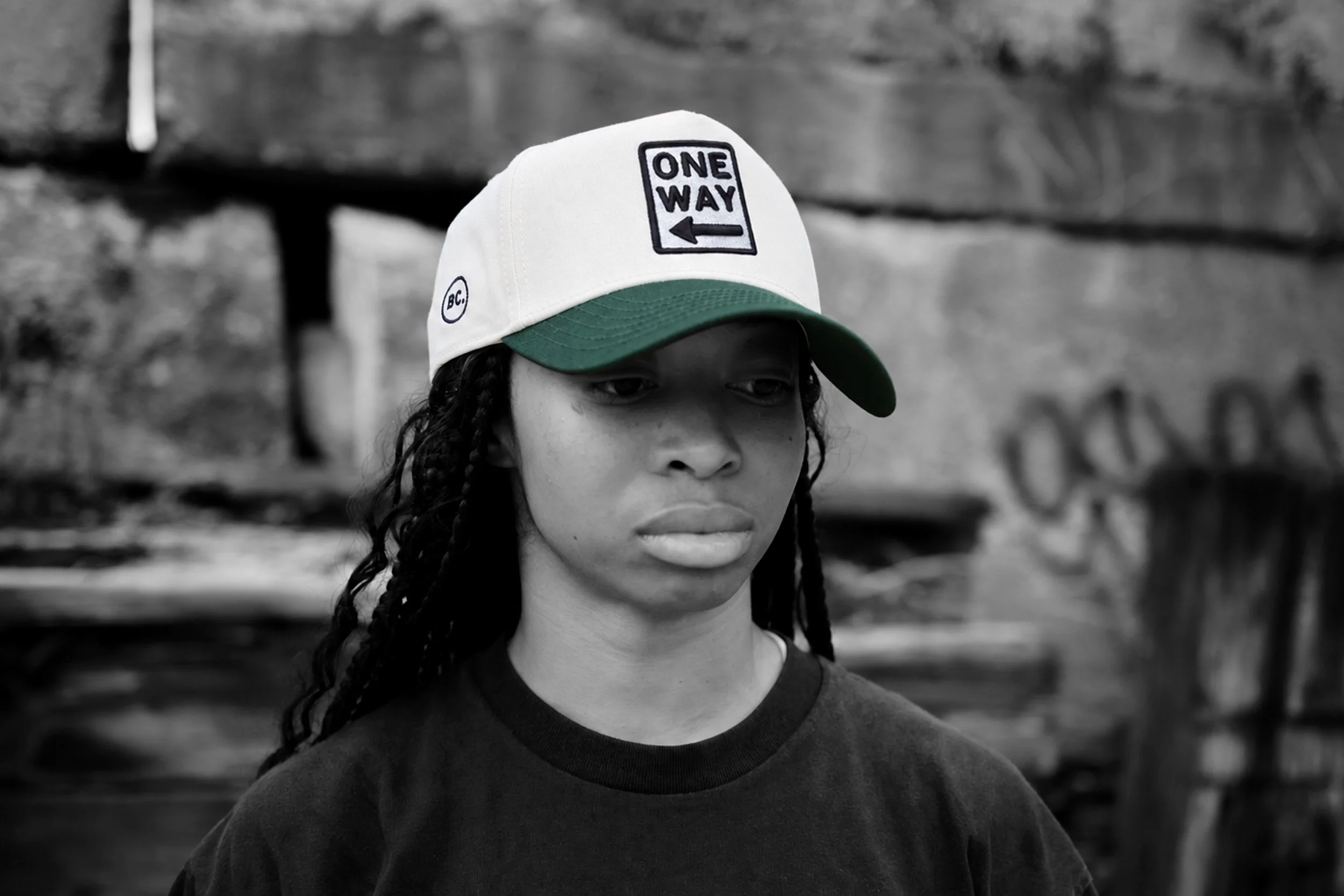A model wearing a two tone One Way Snapback.