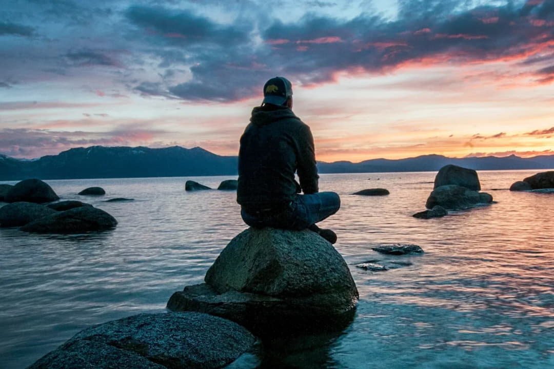 a man looking at the horizon