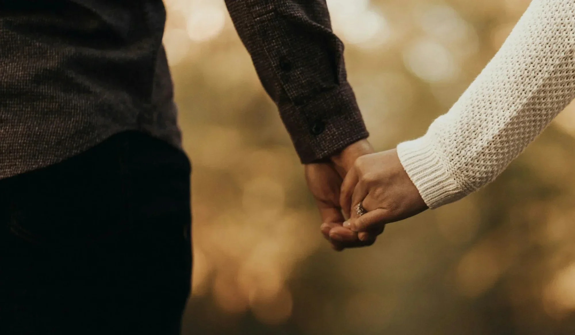 a couple holding hands