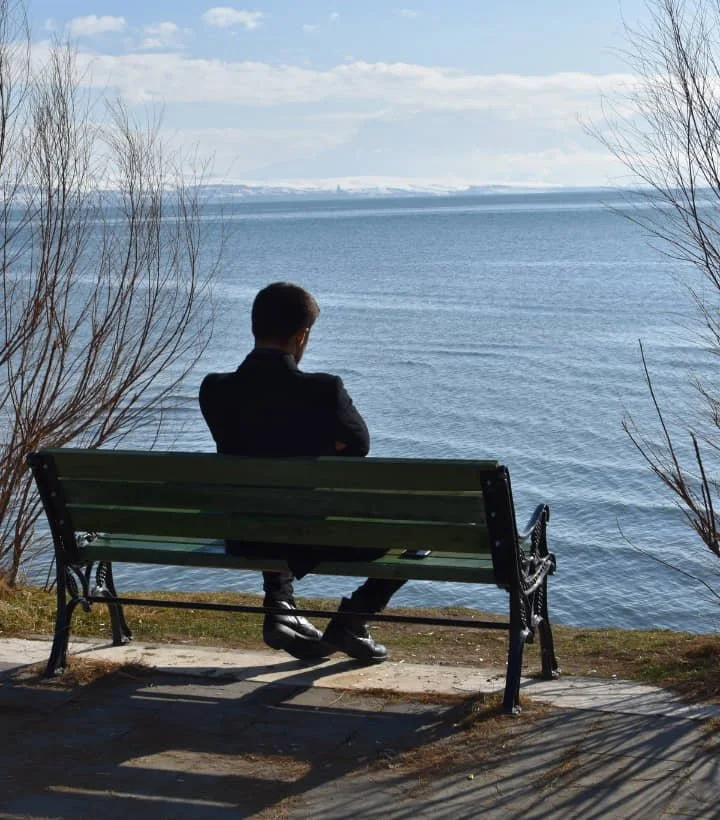 man alone on a bench