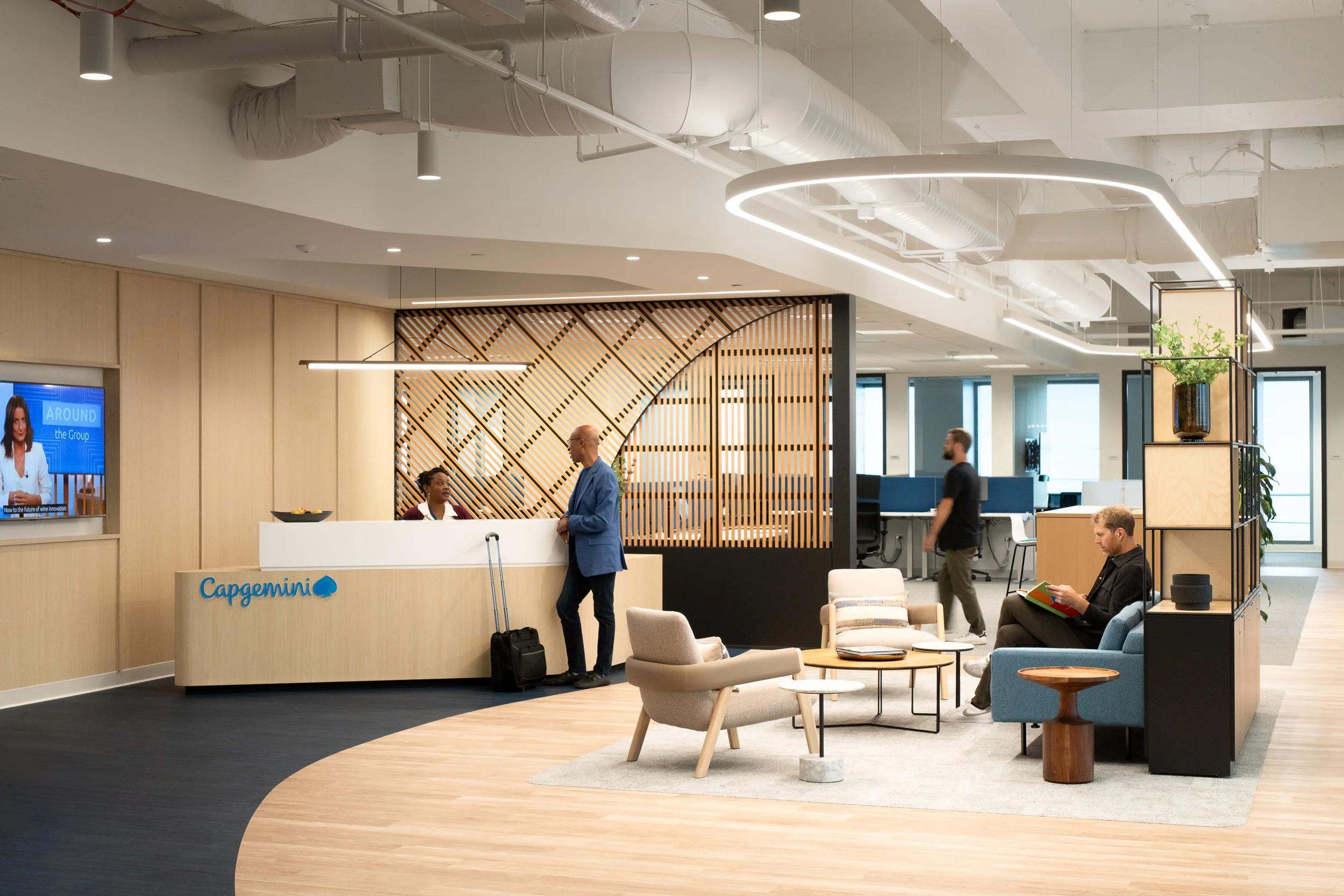 Modern office lobby with a reception desk labeled