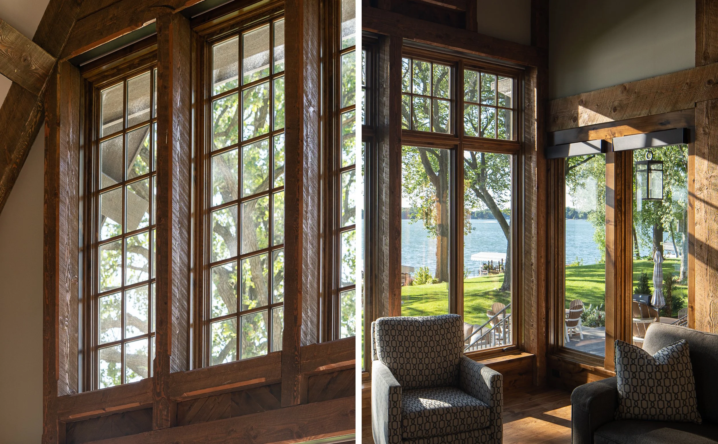 Tall wood-framed windows showing trees and lake view.