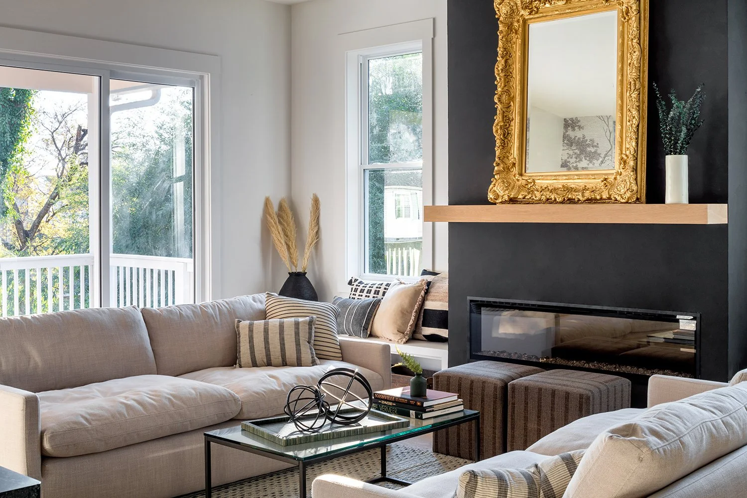 Modern living room with fireplace and golden frame
