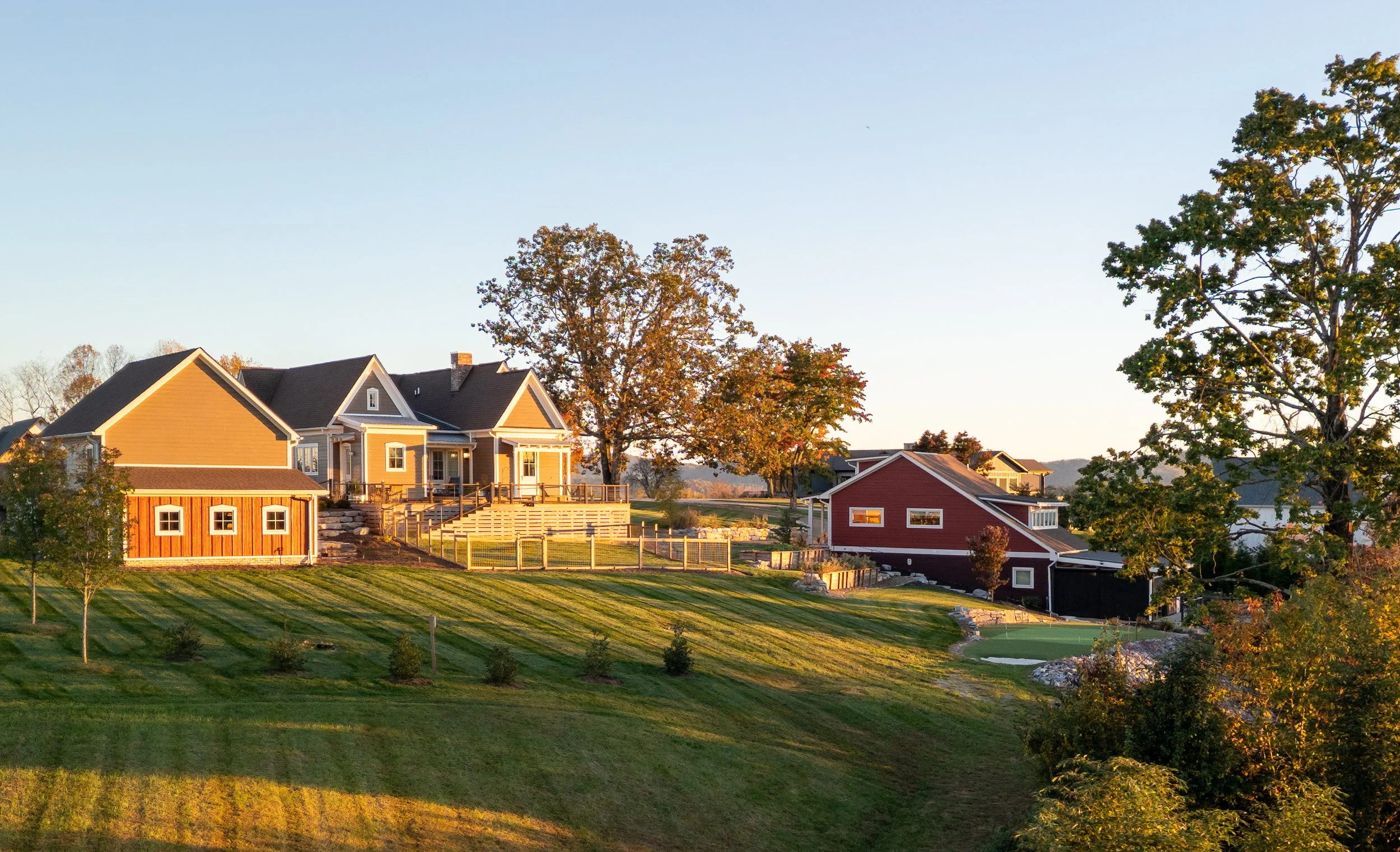 Hillside estate with main residence and distant ridge views in Hendersonville, NC