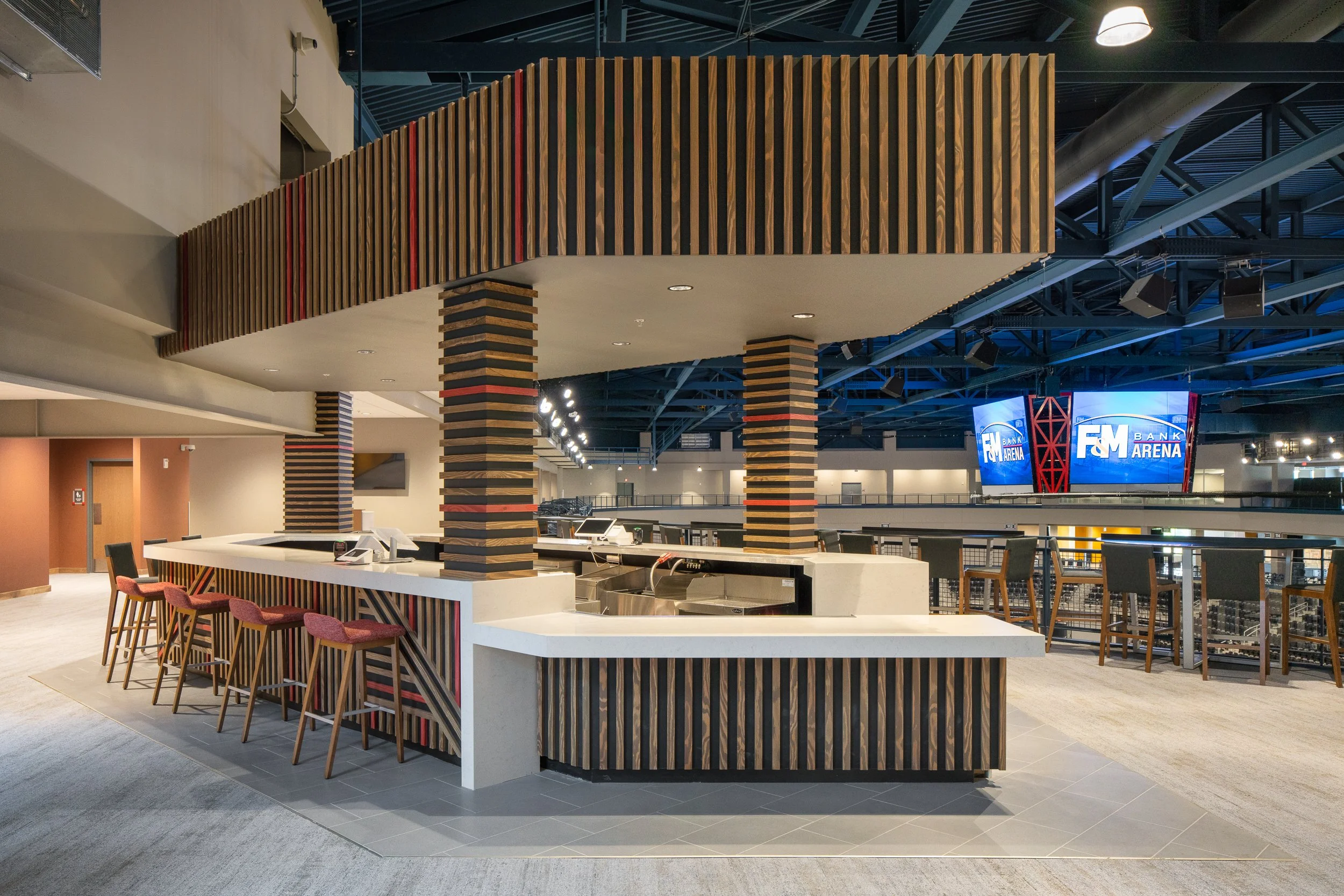 Stylish concession bar with an open view of the arena event space.