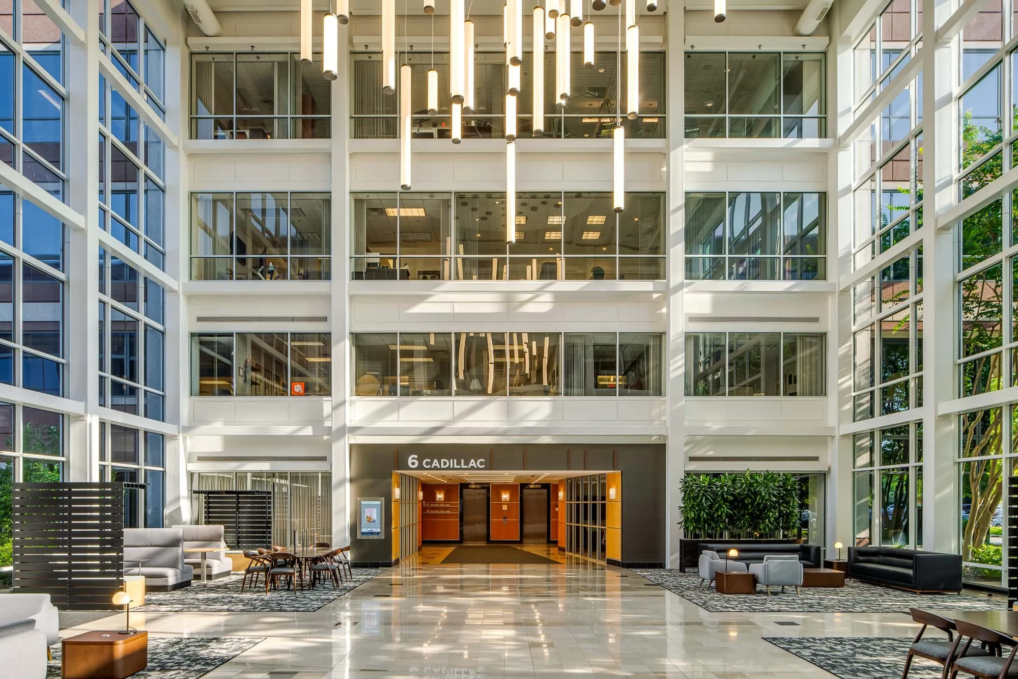 Commercial real estate lobby in Franklin, TN with polished floors, glass walls, and modern lighting