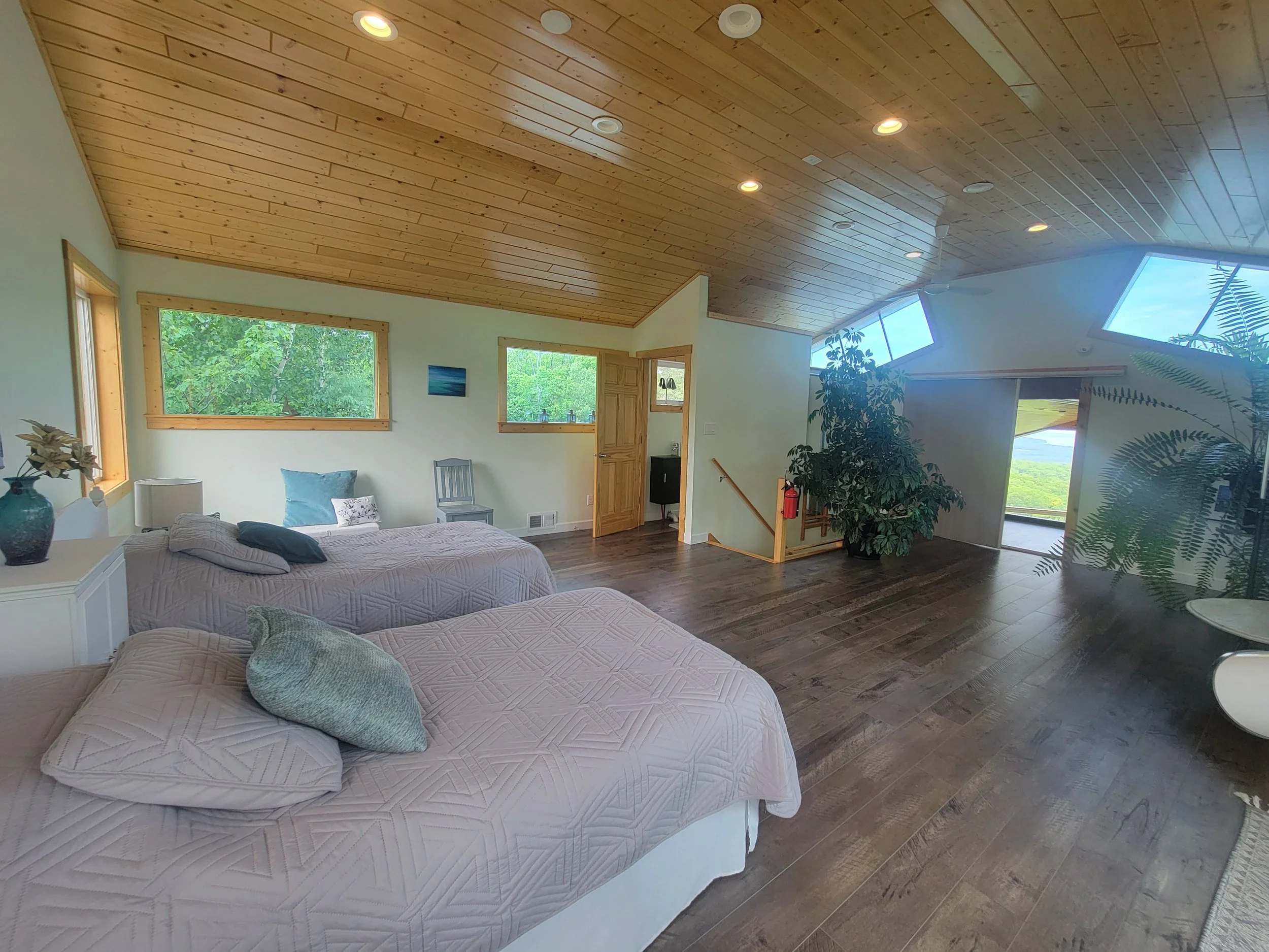 3rd Level Bedroom 1 - 2 Twin Beds with private balcony access and bathroom
