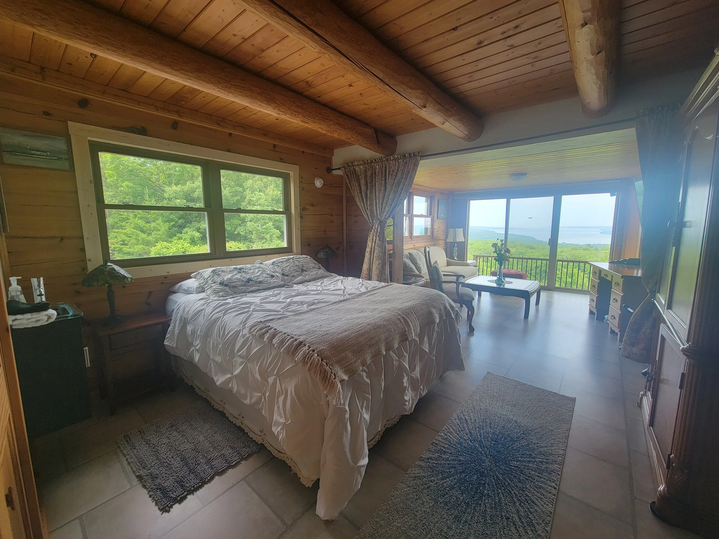 1st Level Bedroom 1 - Queen Bed with Sofa Room and Sink