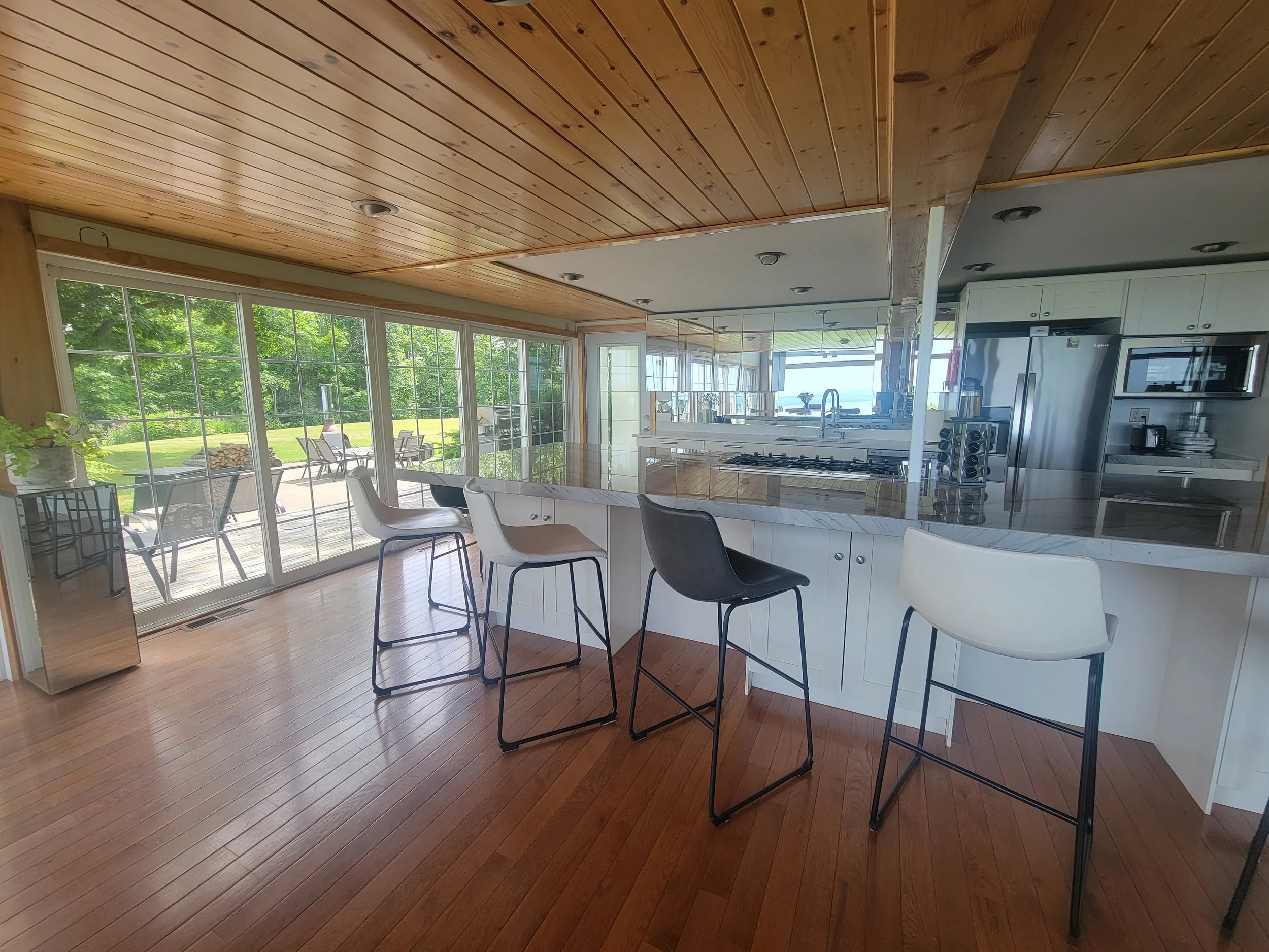Kitchen Island and view of back deck
