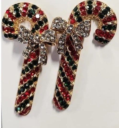 GOLD TONE CANDYCANE EARRINGS WITH STONES BOW TIE