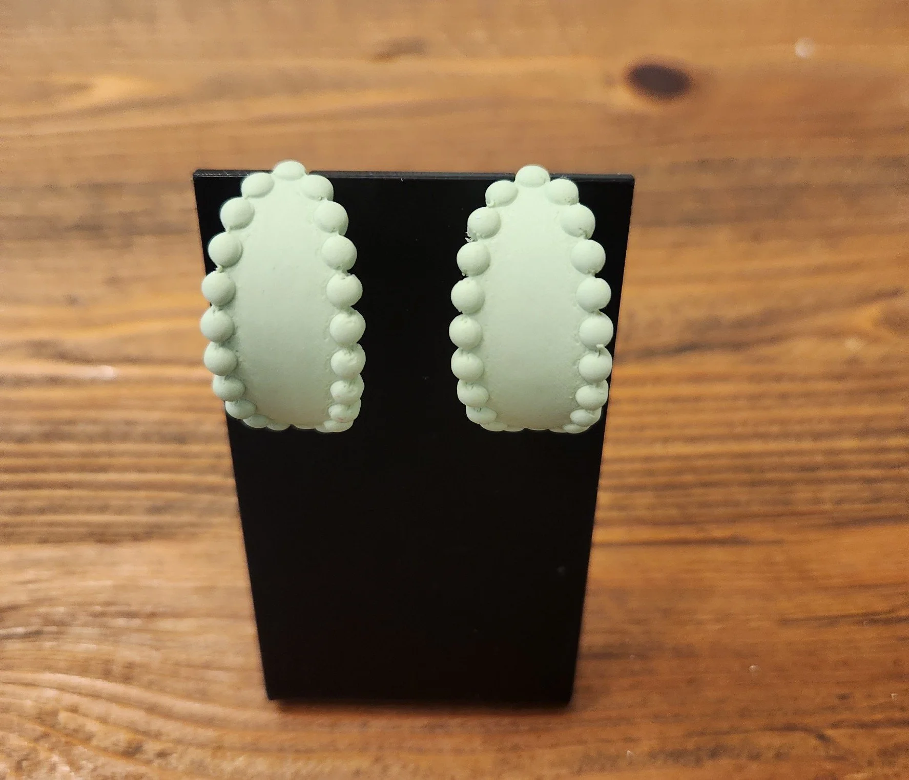 F7200 - OVAL GREEN HUGGIE HOOP EARRINGS.jpg