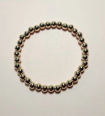 GOLD TONE BEADED BRACELET