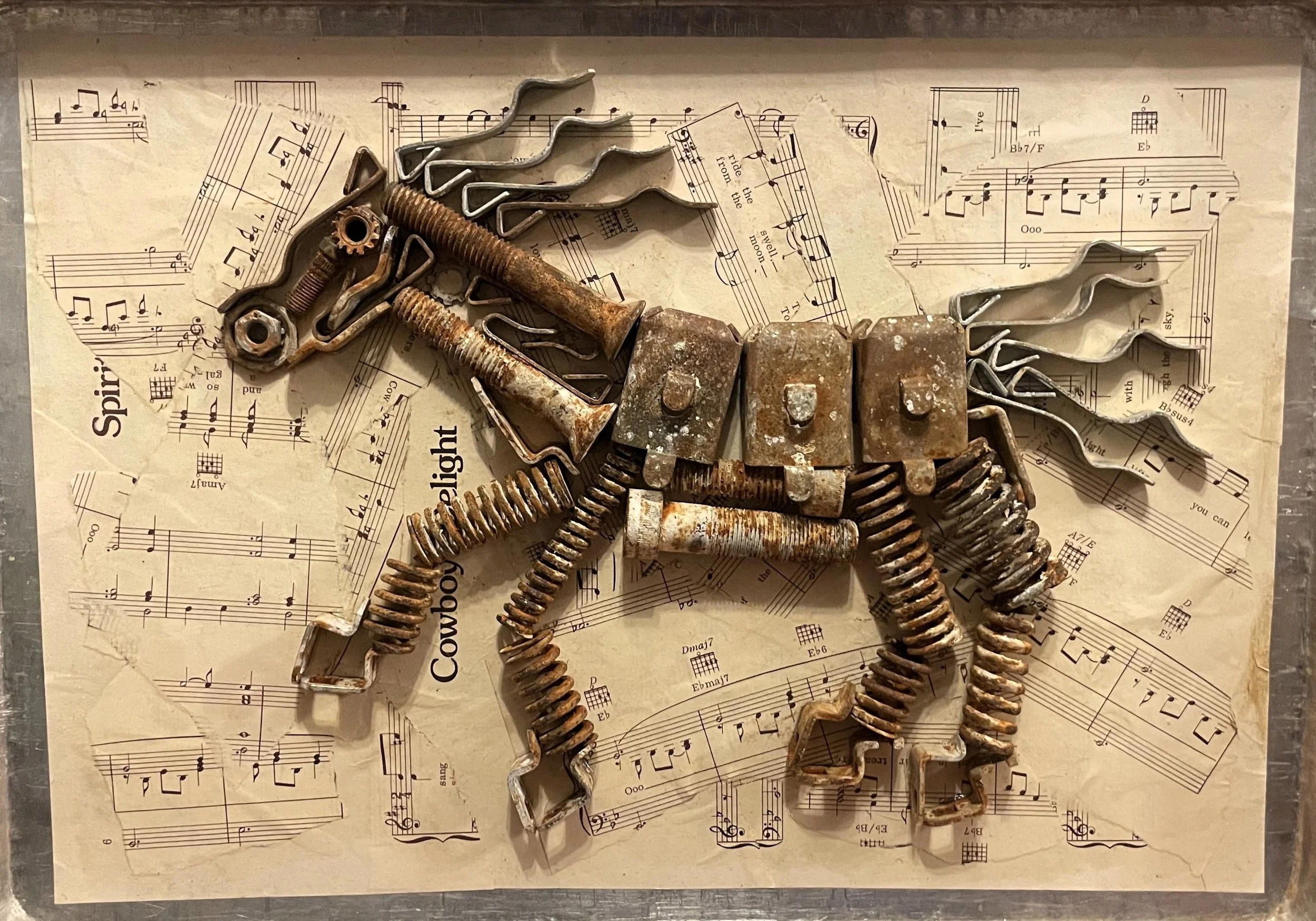 "Horse Runner" 12 x 20in. Found object collage. 2024.