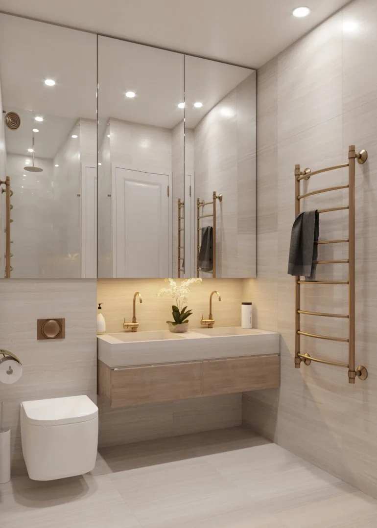 Nature inspired textures and luxury satin brass fittings in the couple's bathroom
