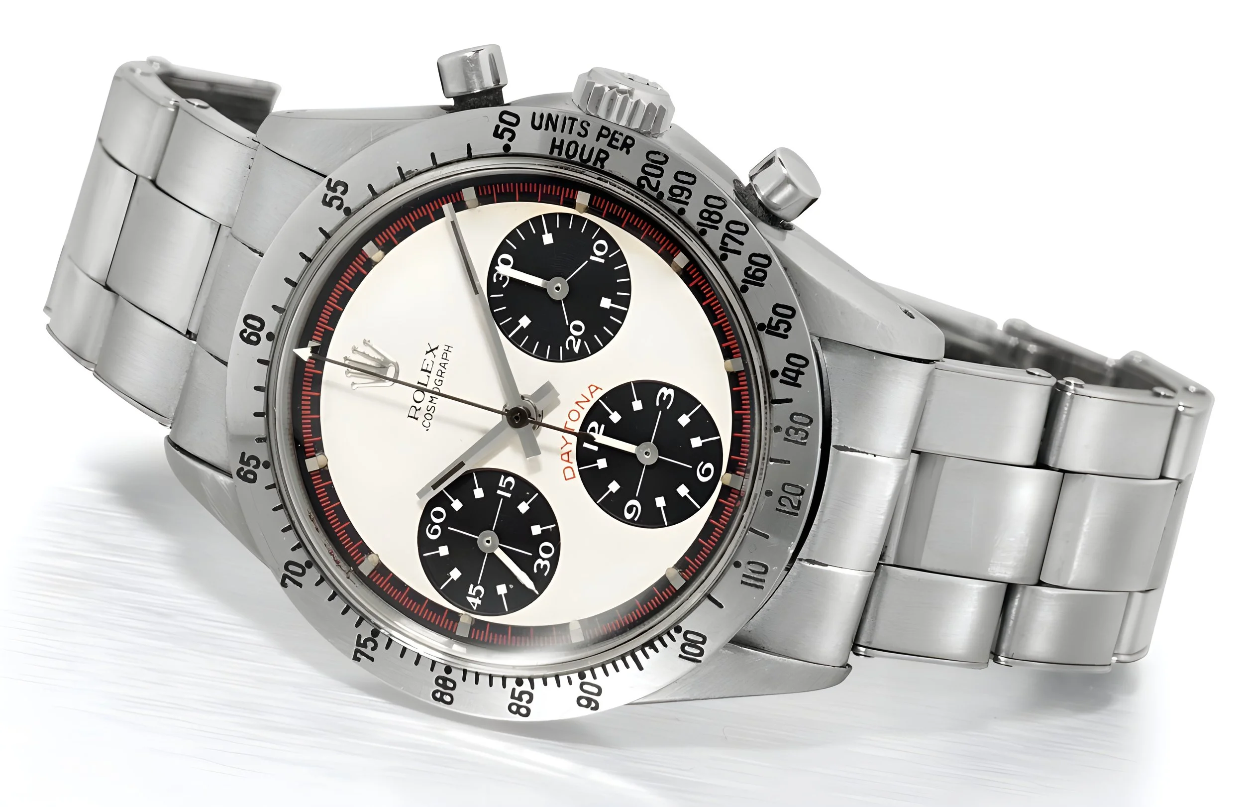 A stainless steel Rolex Cosmograph Daytona wristwatch with a white dial, three black sub-dials, and a tachymeter bezel.