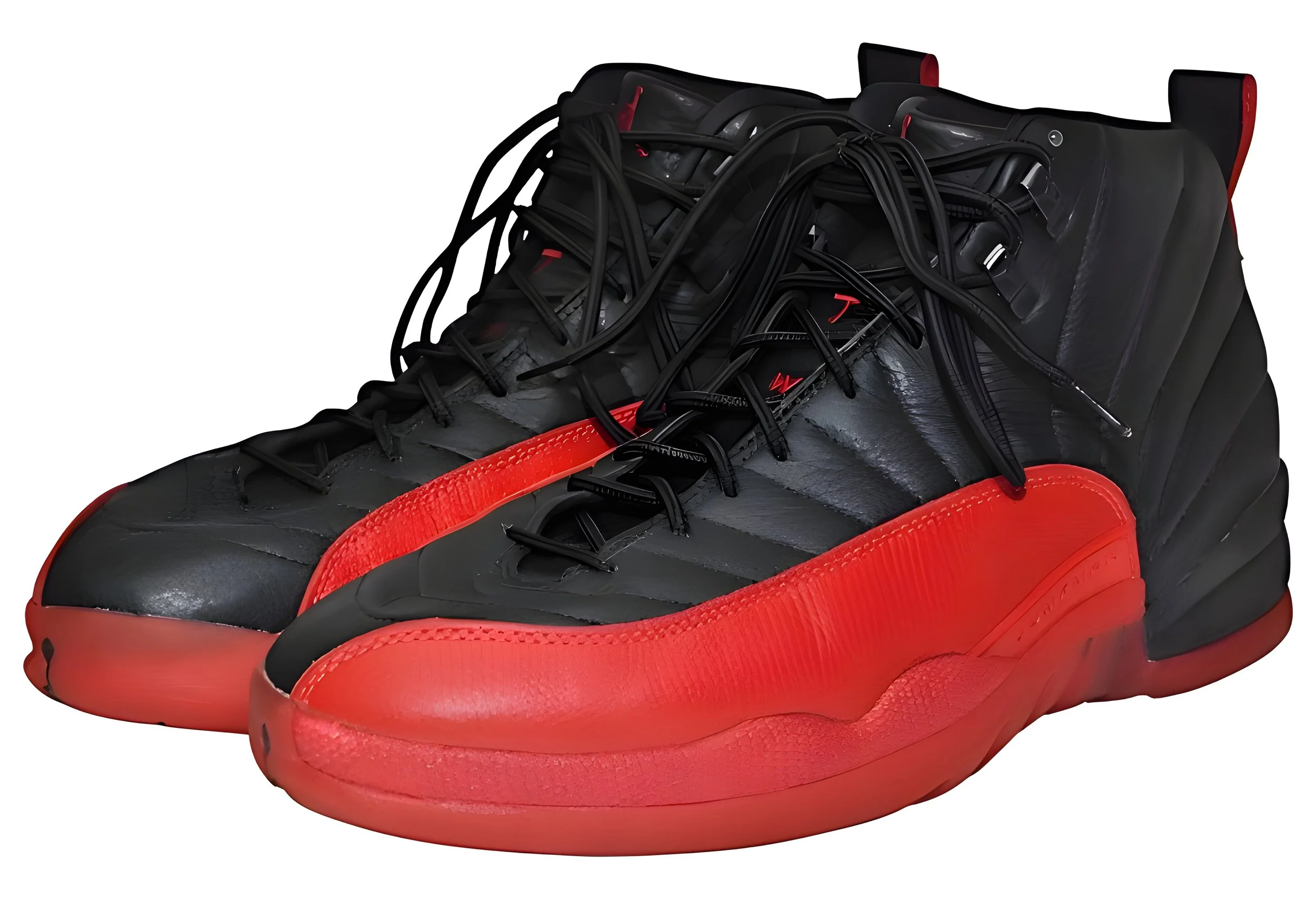 A pair of black and red athletic shoes with a modern, sleek design, featuring a black upper with red accents and a textured red sole.