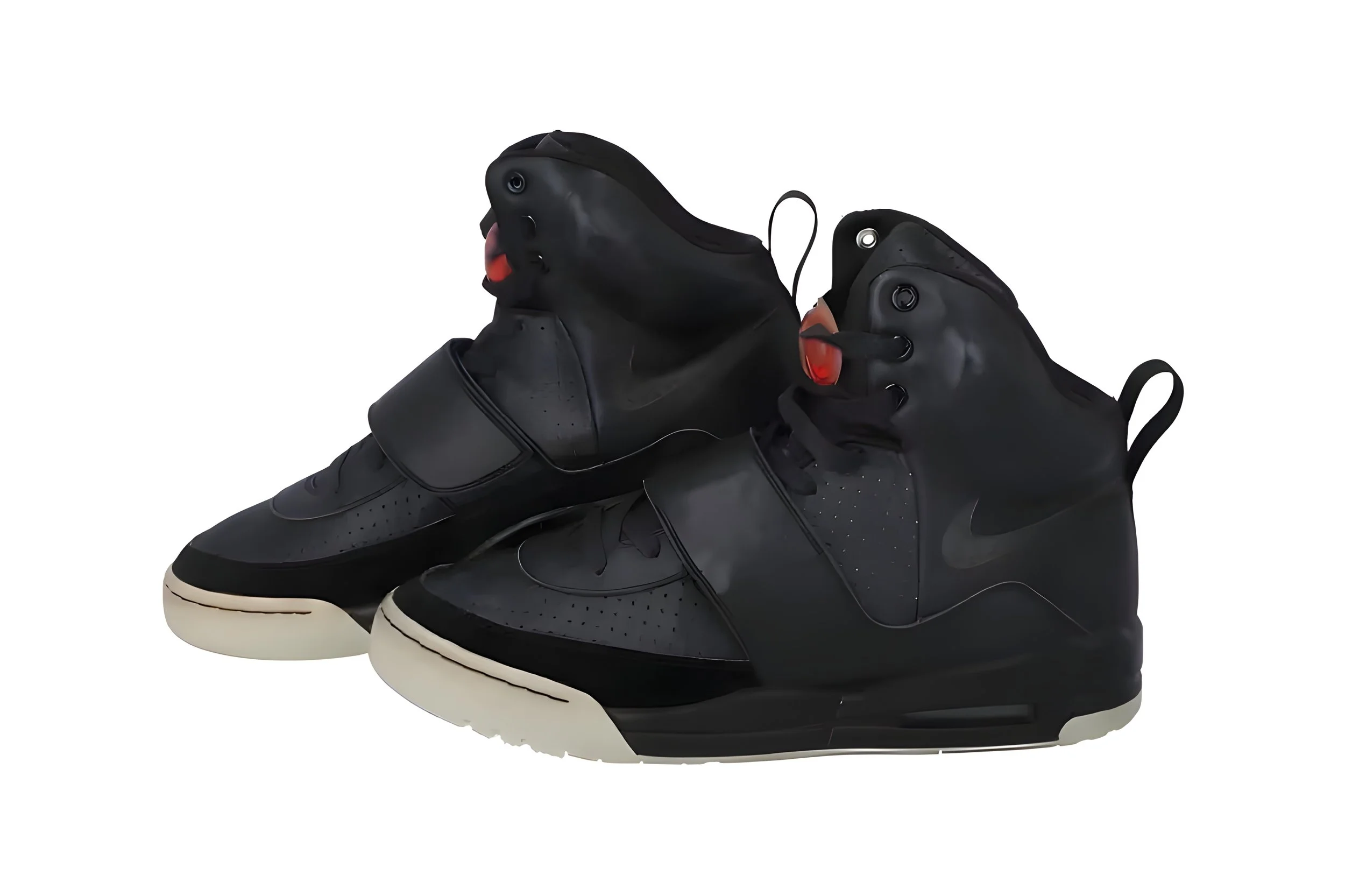 A pair of black high-top Nike sneakers with Velcro strap and white soles.