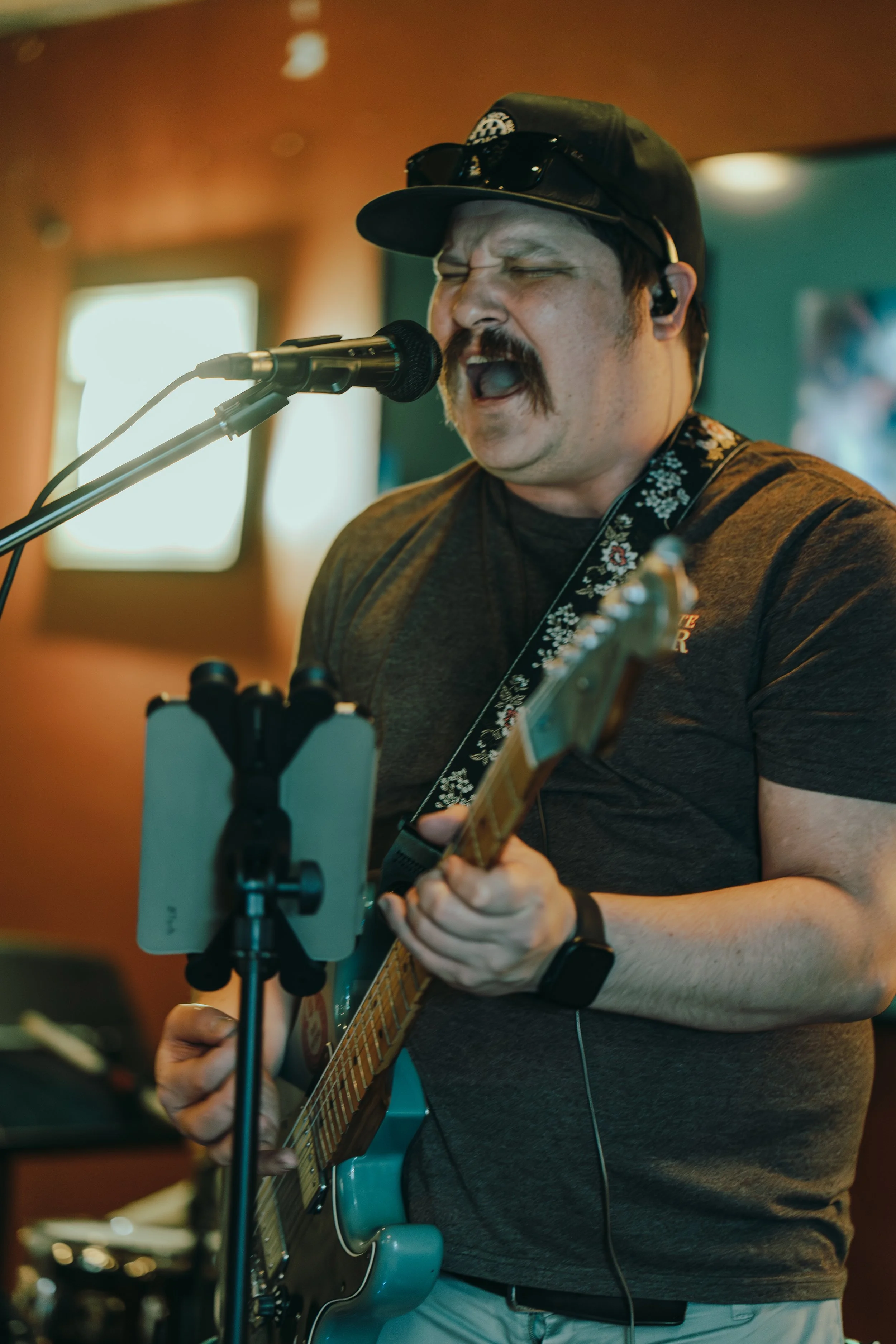 Professional musician set up for a pristine live performance tracking session.