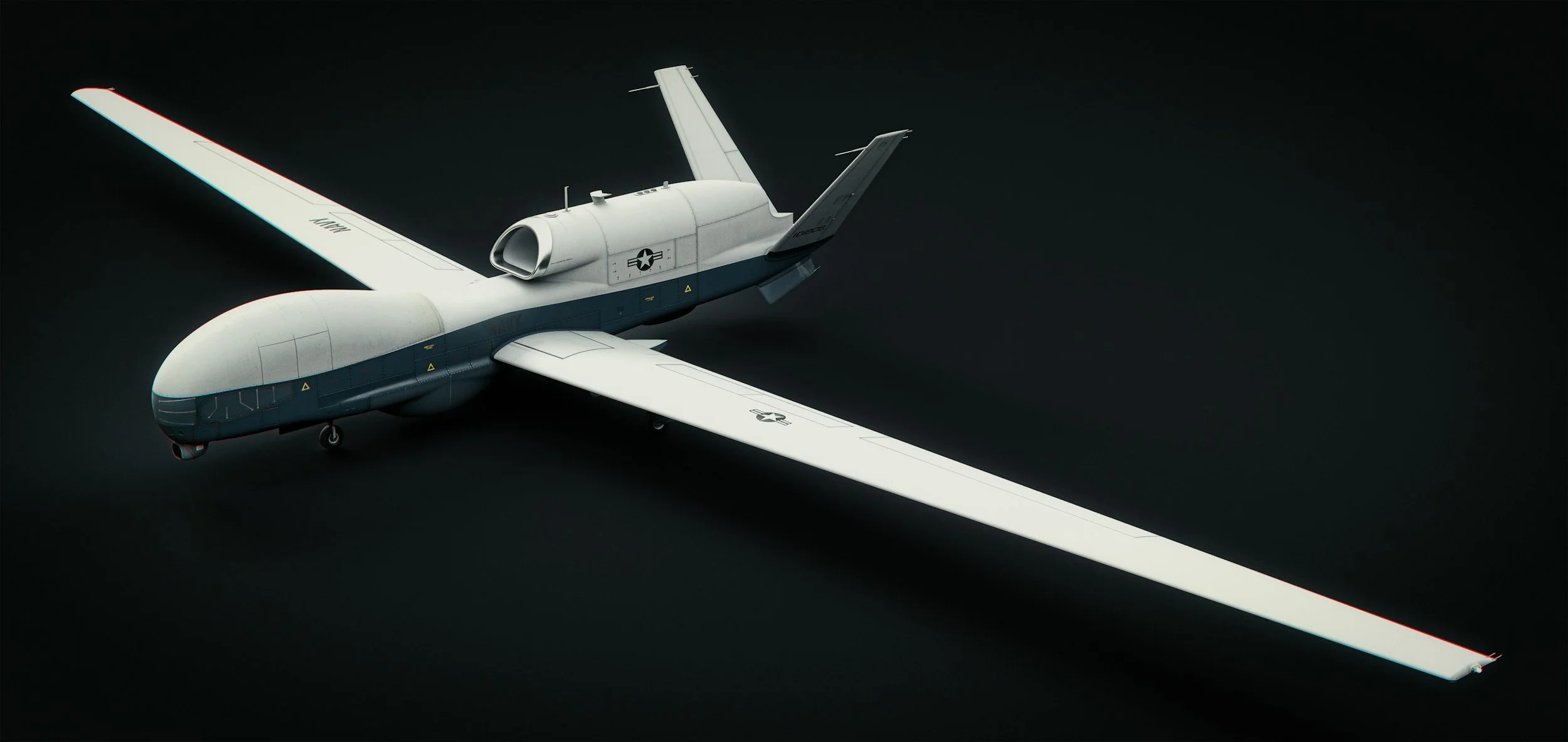 A model of a futuristic military drone aircraft with white and gray coloring, featuring a sleek, rounded nose, wing-mounted stabilizers, and military markings, set against a dark background.