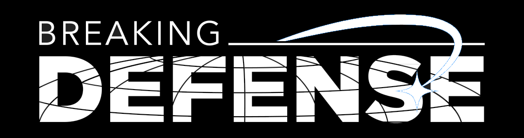 Graphic with the text "Breaking Defense" on a black background, featuring white and blue stylized design elements.