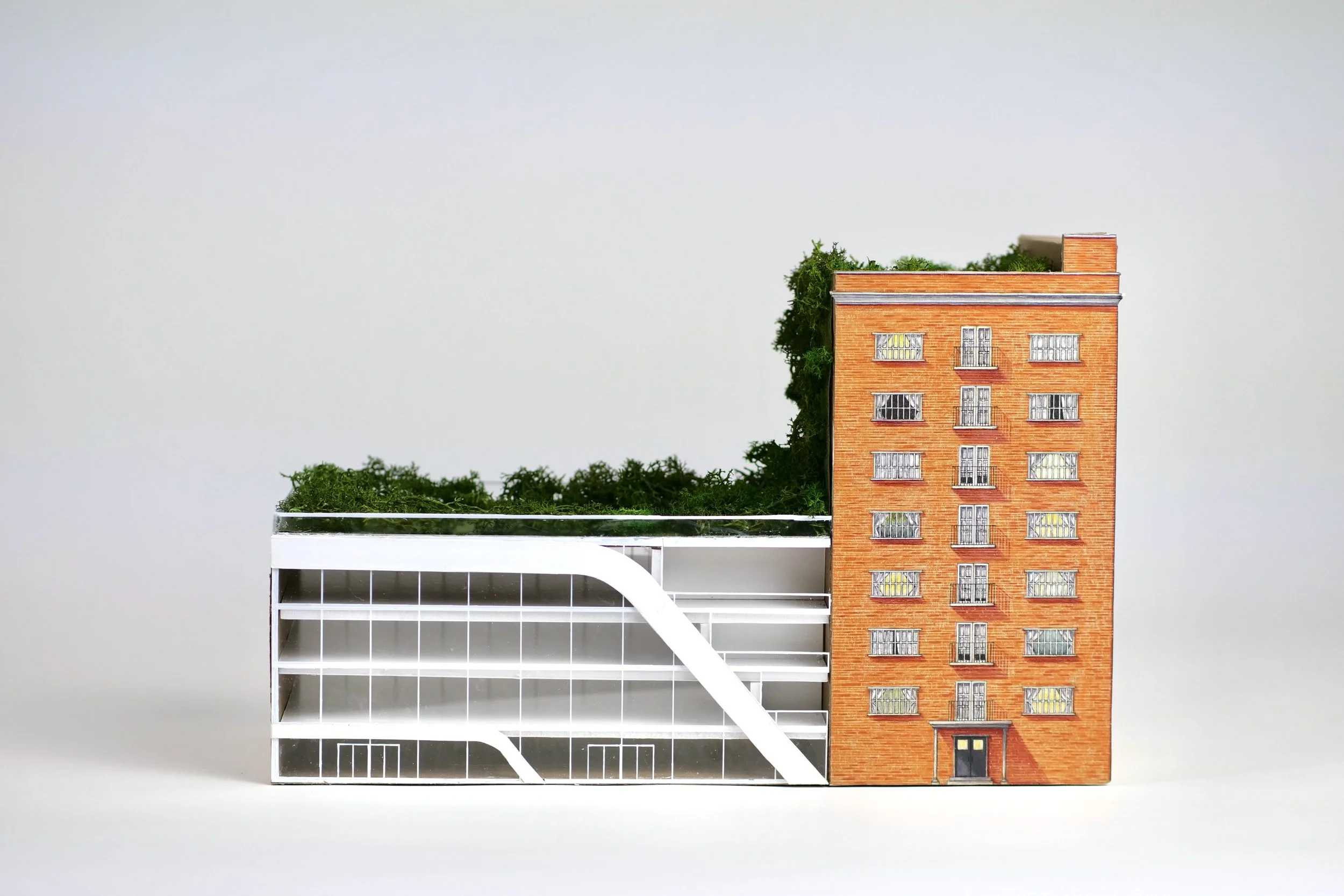 Bridging Old and New New York
-A project focused on the connection of an old brick apartment and a modern multi-use building through greenery and open balcony space